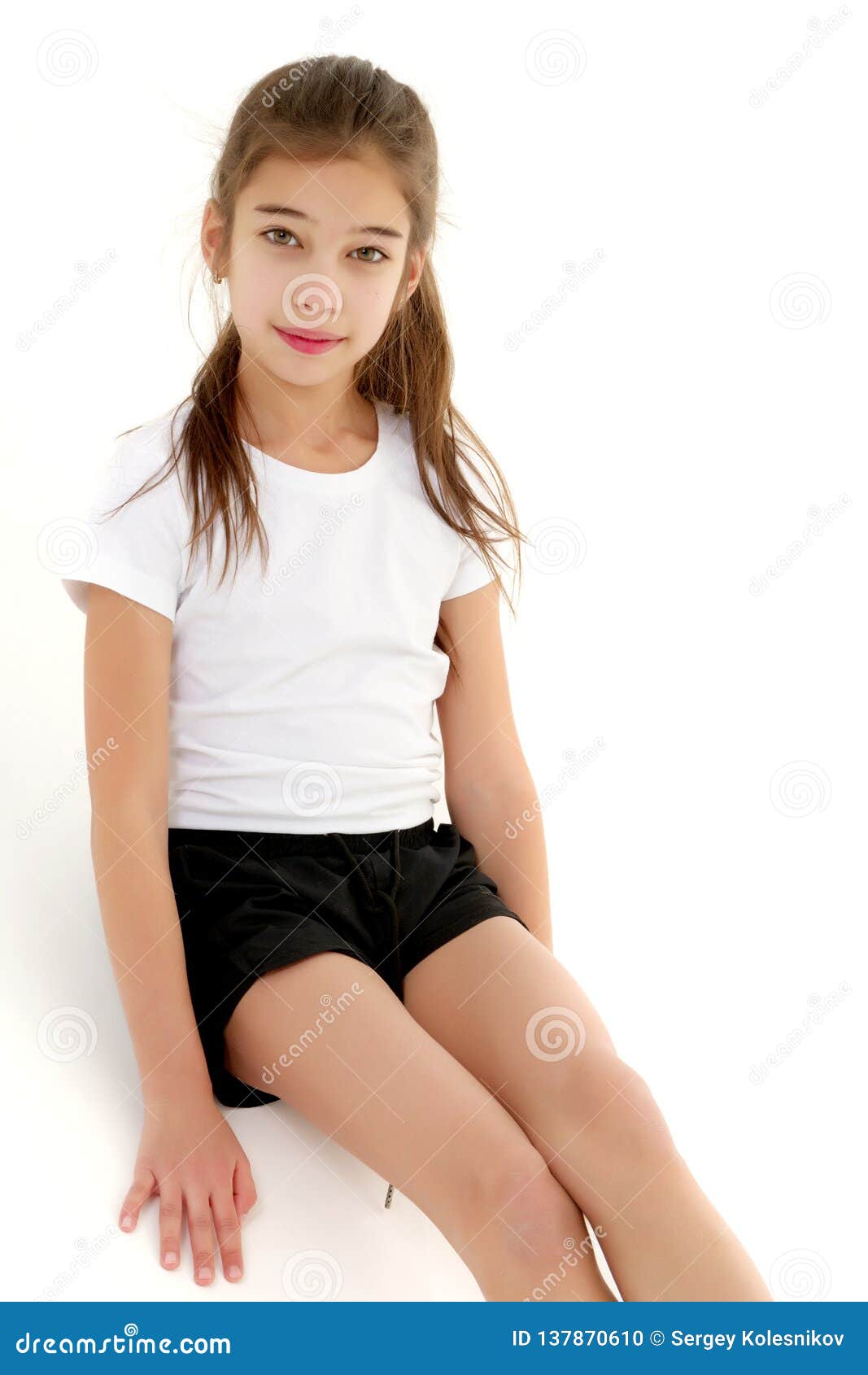 Little Girl in a Pure White T-shirt for Advertising and Shorts. Stock Photo  - Image of background, blank: 137870610