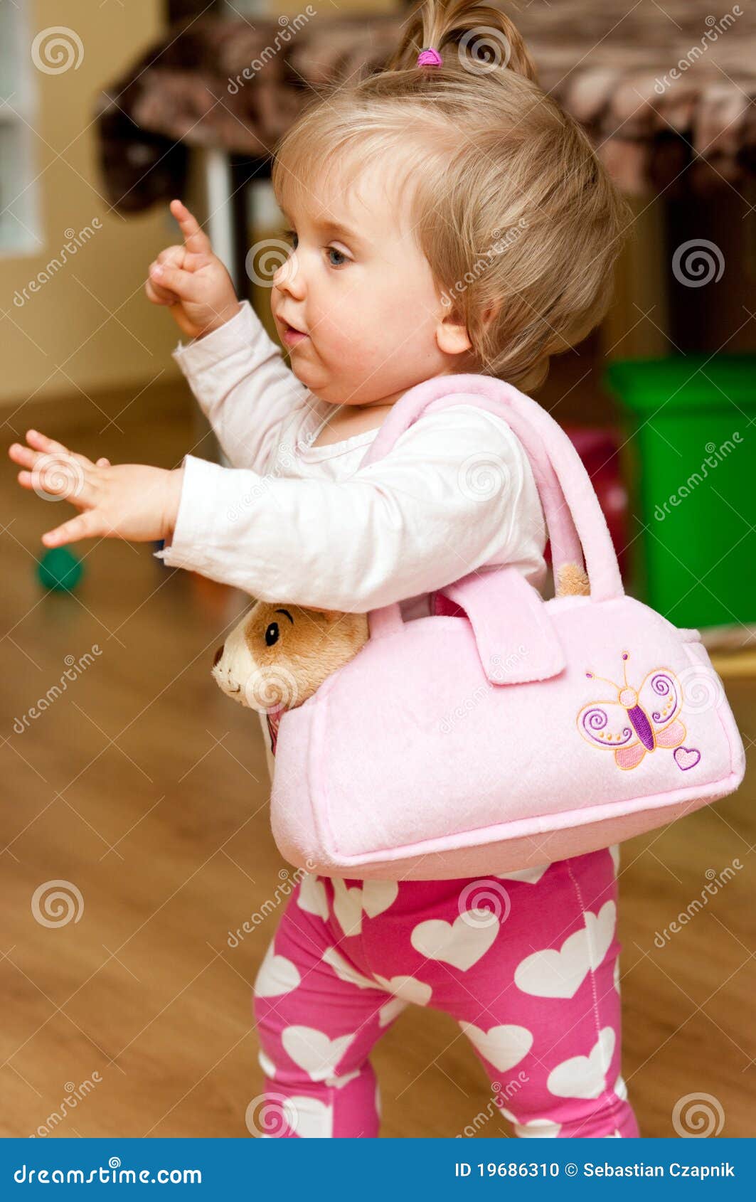 Little girl with purse stock photo. Image of childhood 19686310