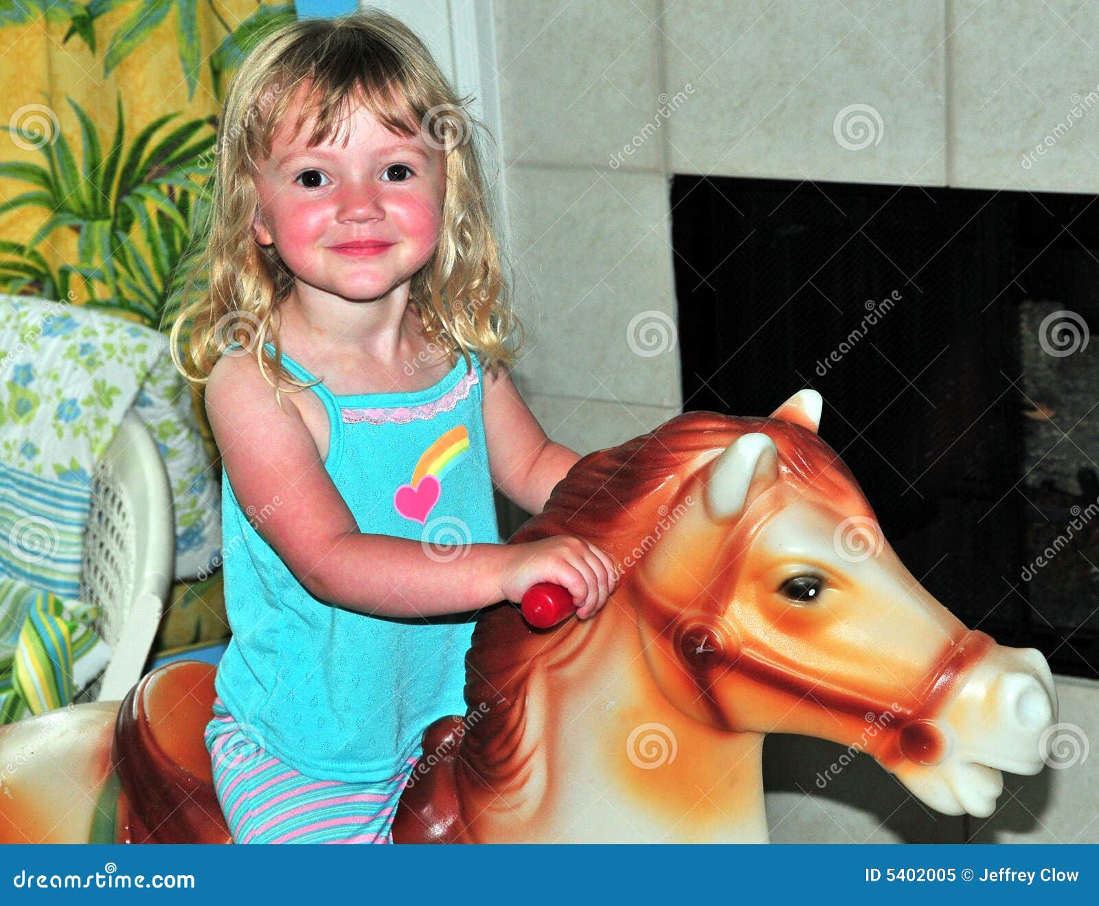 little girl rocking horse