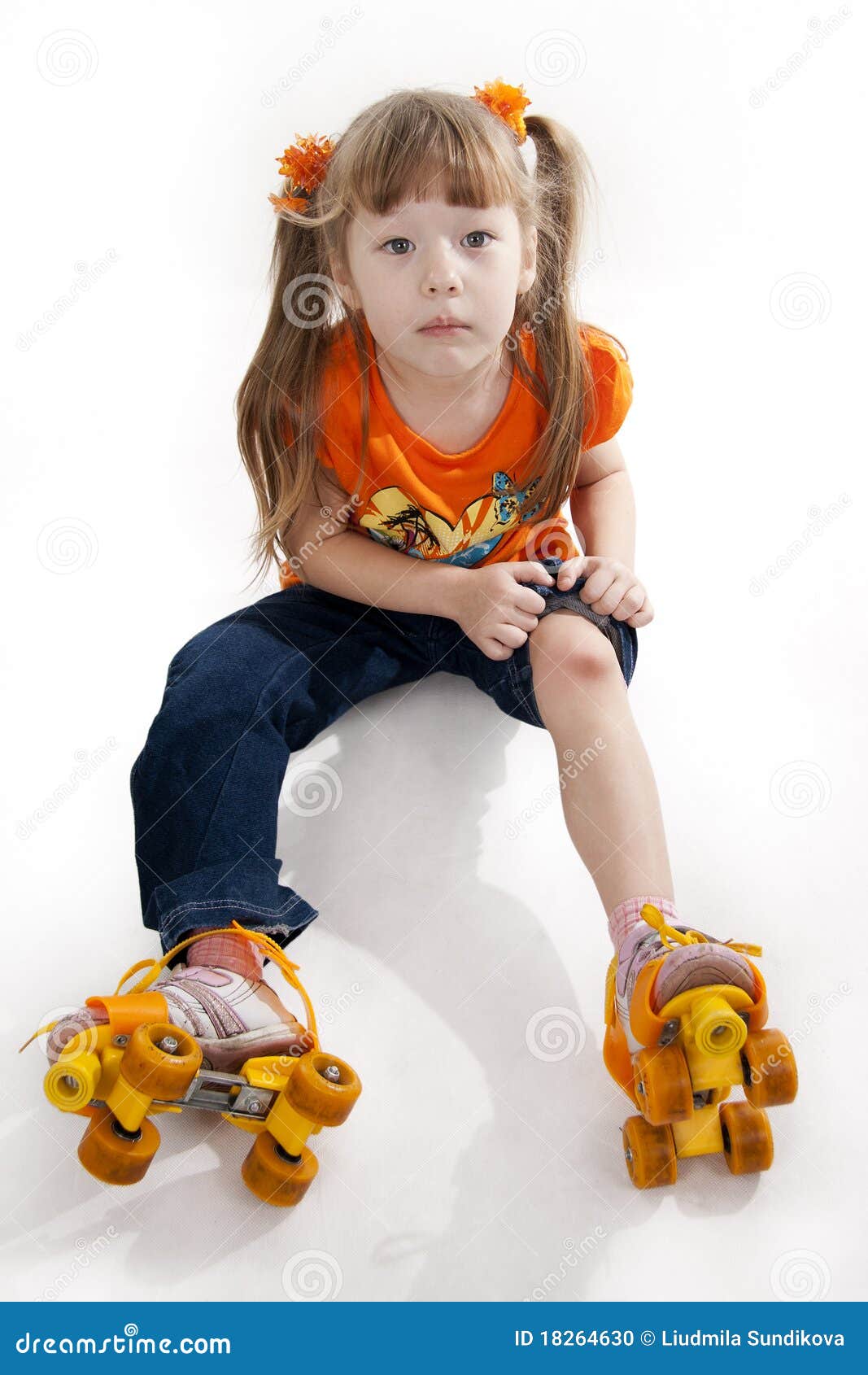 The Little Girl on Roller Skates Stock Photo Image of knee, playing 18264630