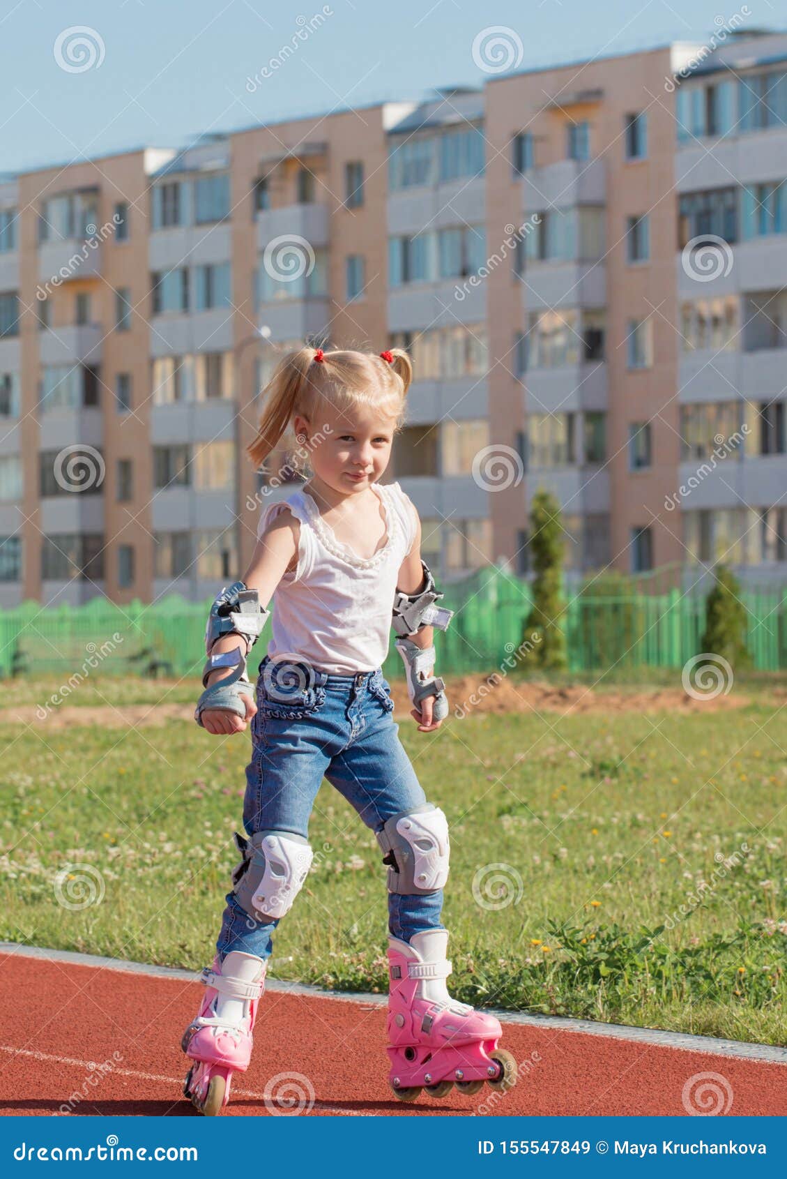 Little Girl Rollerblading Rides in Stadium Stock Image Image of girl