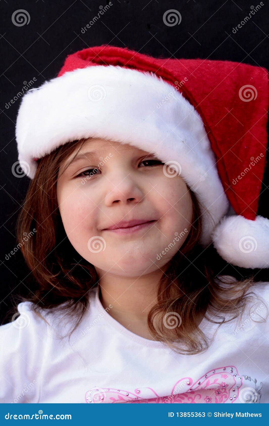 Little Girl With Santa Hat On Stock Photos - Image: 13855363