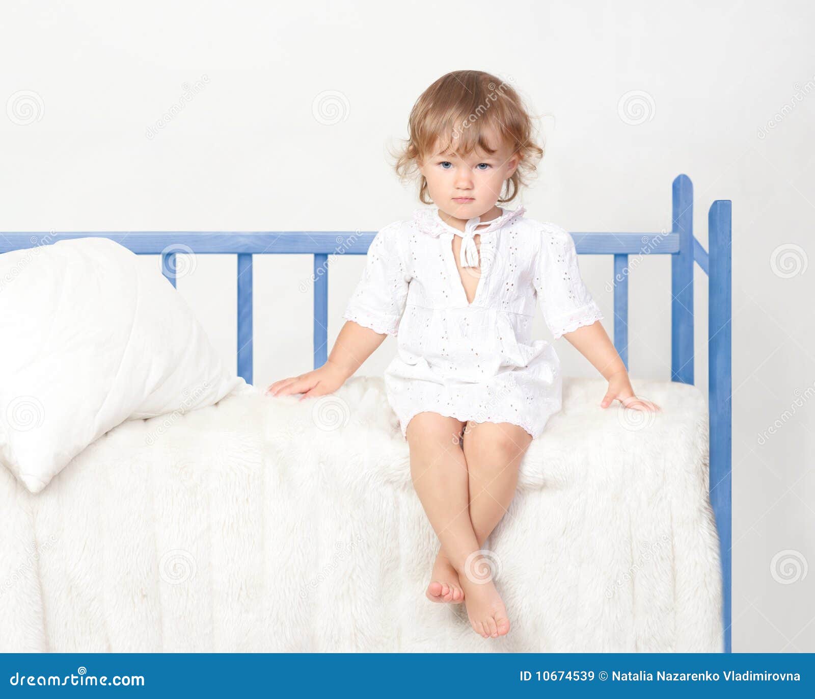 Little Girl Sitting On The Bed Stock Image - Image of ...