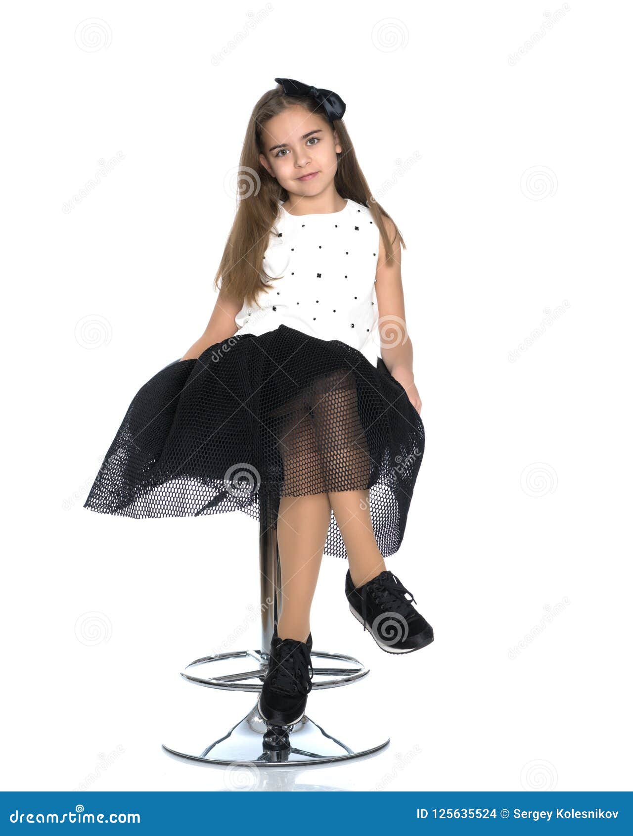 Little Girl is Sitting on a Chair Stock Photo - Image of attractive ...