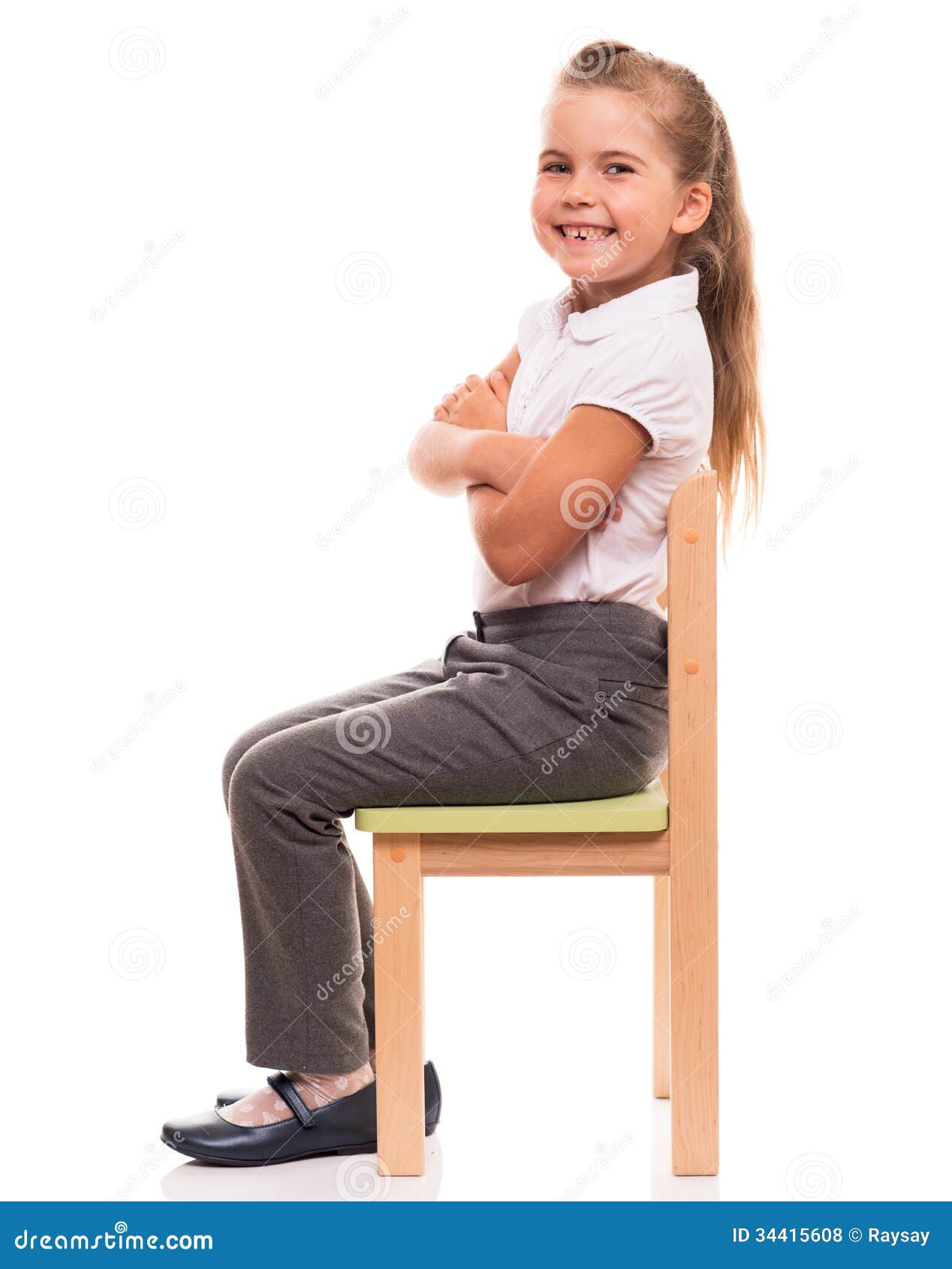 Little Girl Sitting on a Chair and Smiling Stock Photo - Image of ...