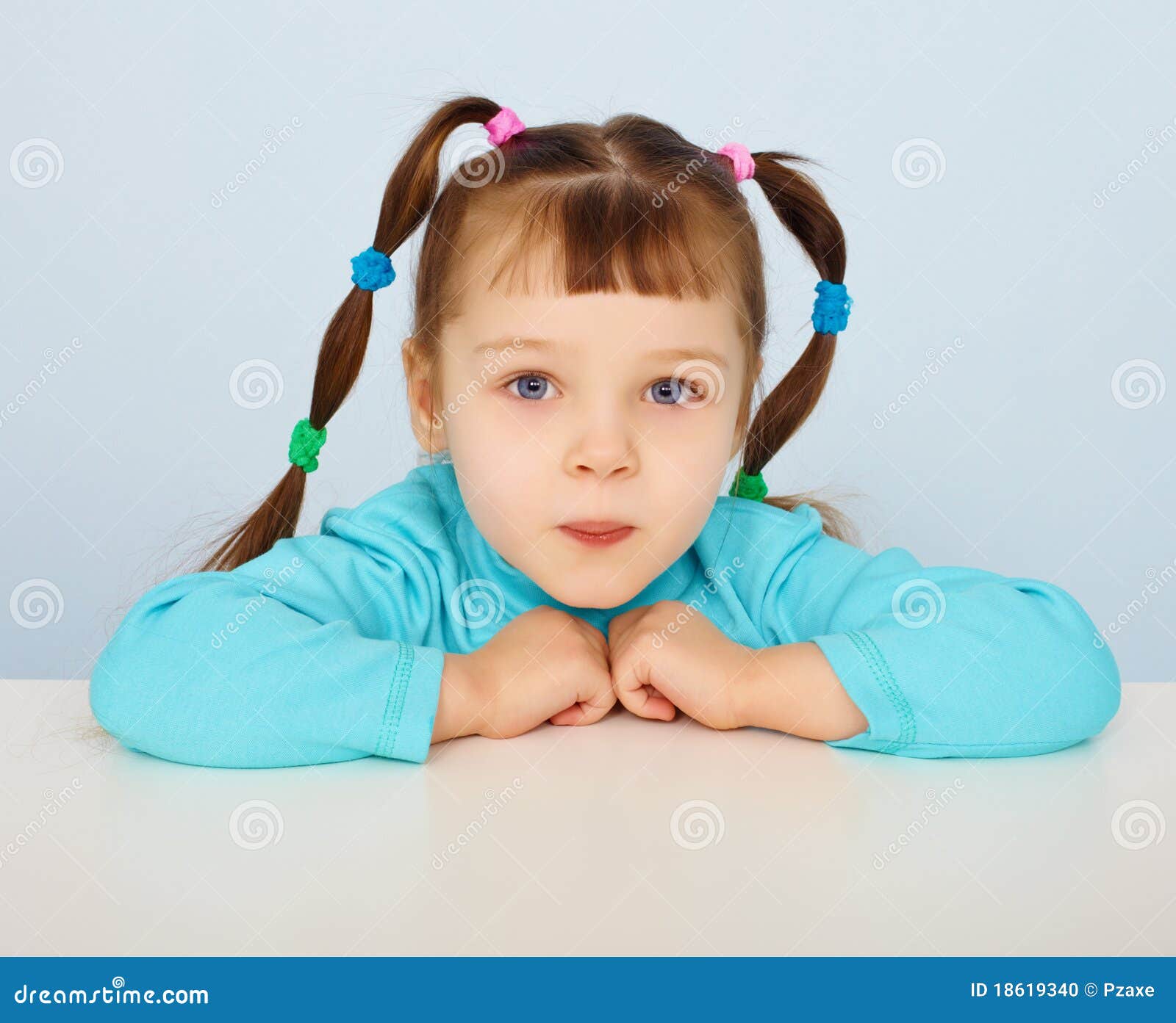 Little Girl Sitting at Desk Stock Photo - Image of blue, people: 18619340