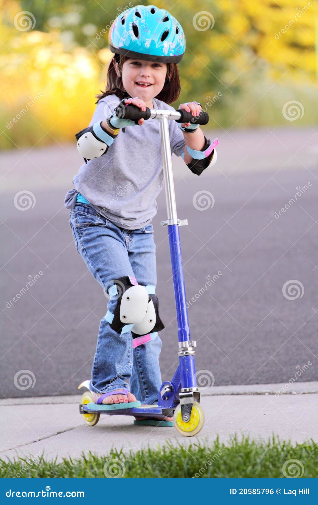 little girl on scooter