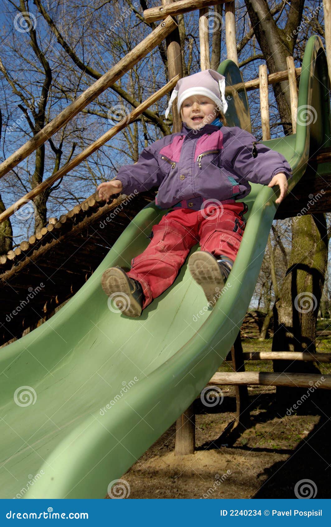 Little Girl On Slide Stock Images Image 2240234