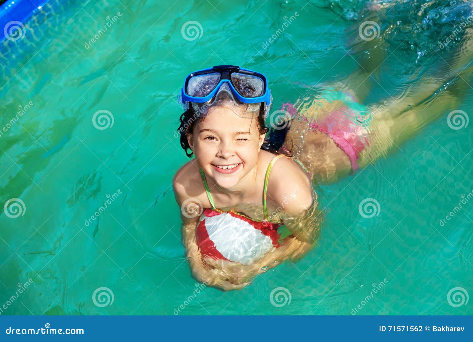 Little Girl In Swimming Pool. Stock Photo - Image of 