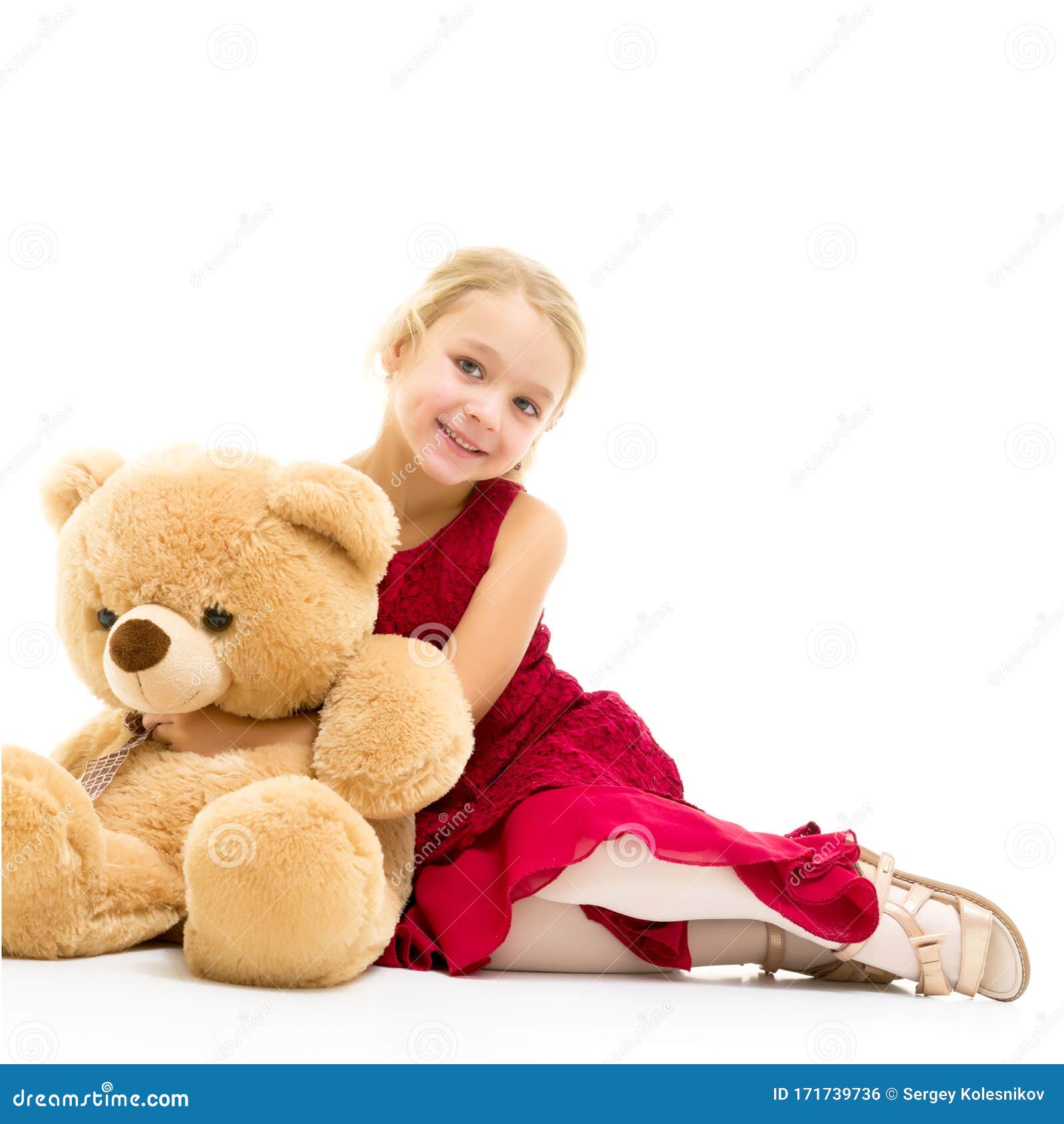 a girl with teddy bear