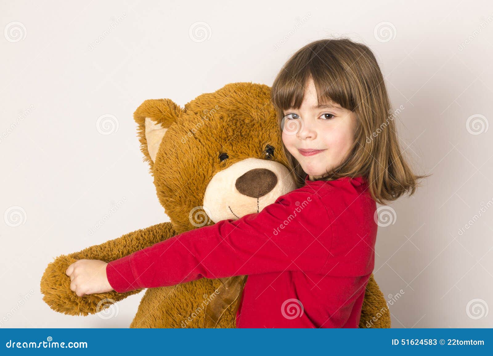 Little Girl and Teddy Bear stock image. Image of embracing - 51624583