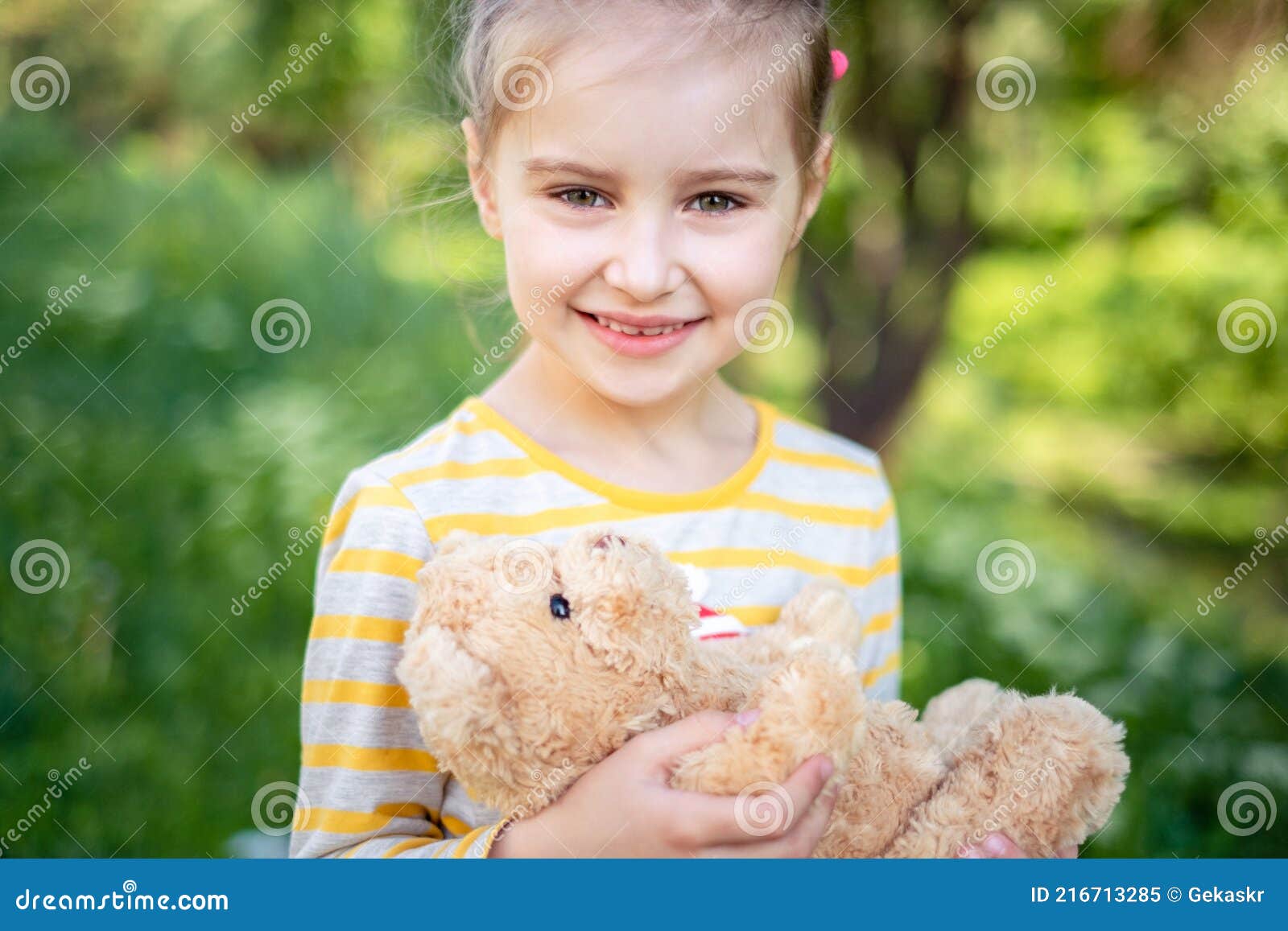 Little Girl with Teddy Bear in Park Stock Image - Image of beauty, cute ...