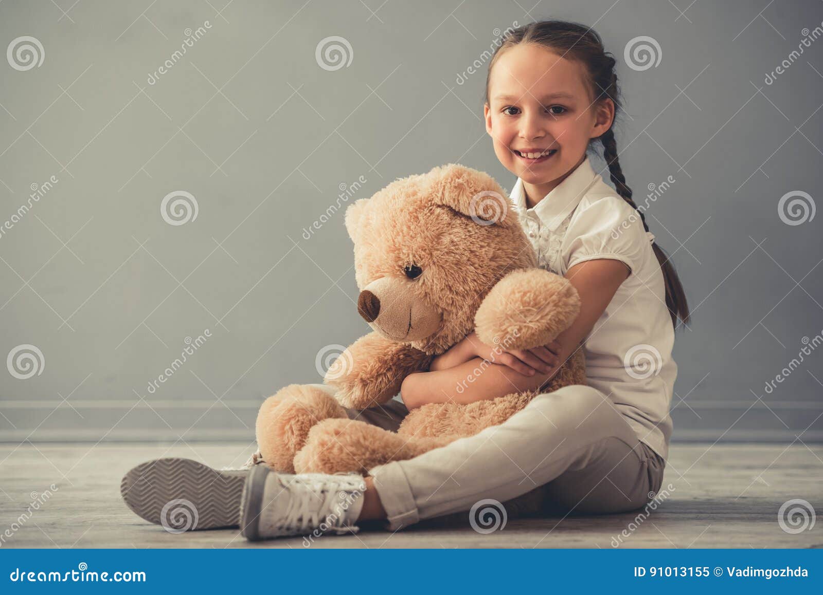 Little girl with toy stock image. Image of look, expression - 91013155