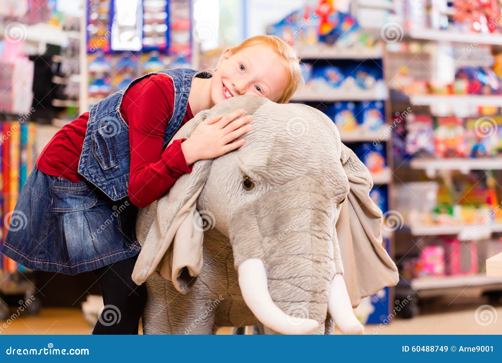 Little Girl In Toy Store Cuddling With Stuffed Animal Stock Image - Image of people, toys: 60488749