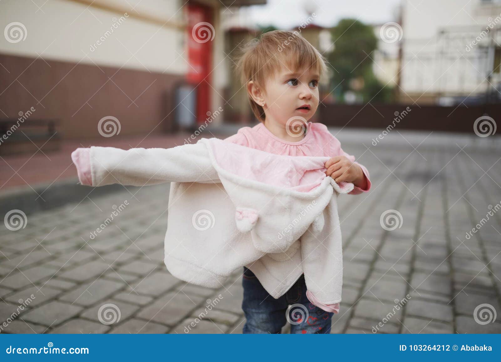 little girl tried to get dressed wrong way