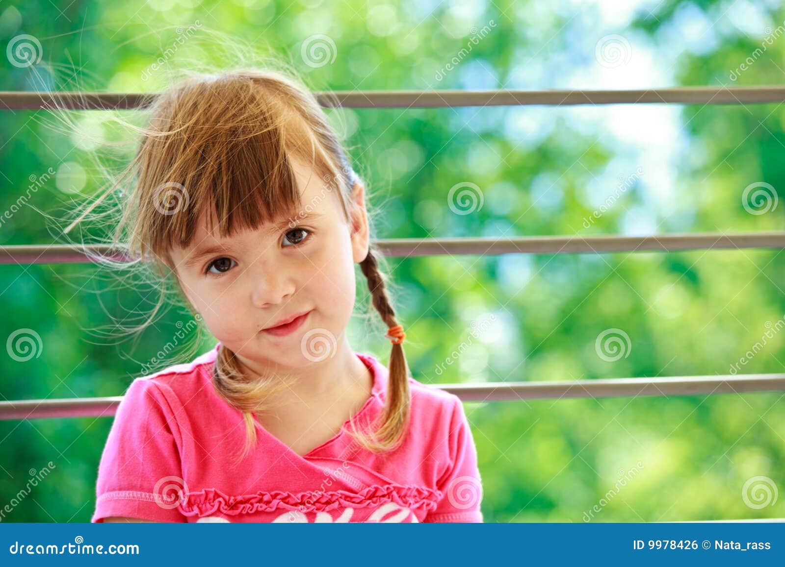 Little Girl with Two Plaits Stock Photo - Image of horizontal, funny ...