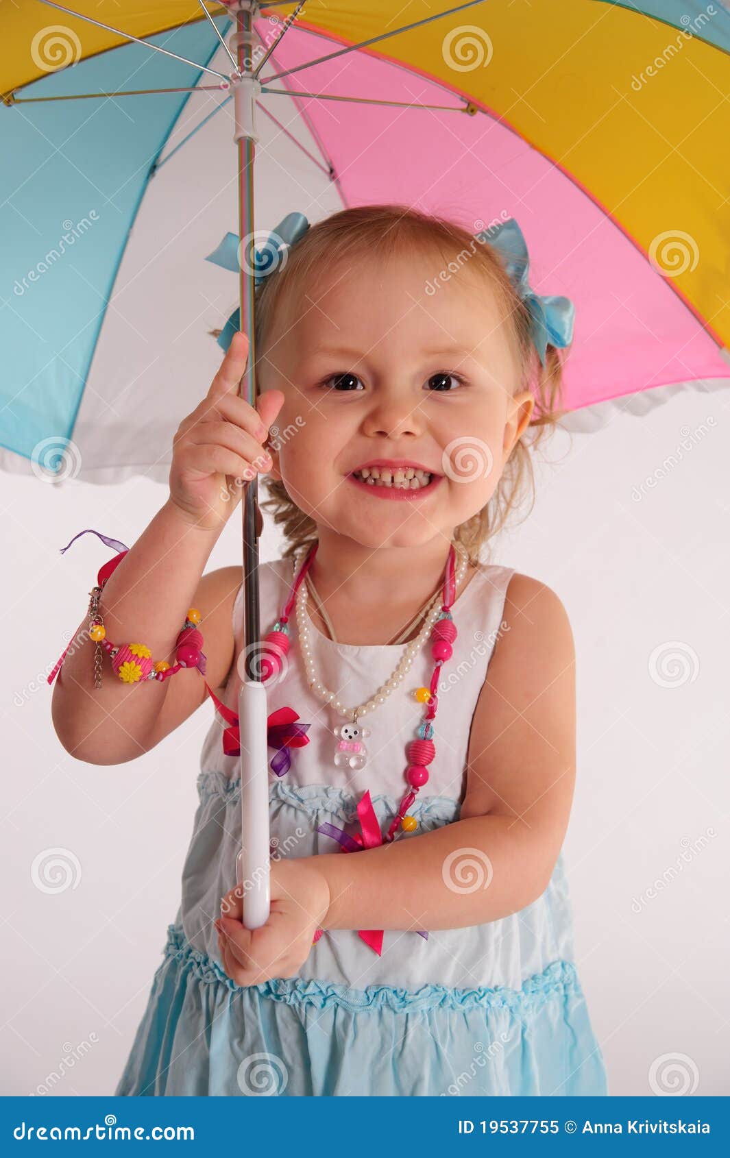 Little girl with umbrella stock image. Image of expressive - 19537755