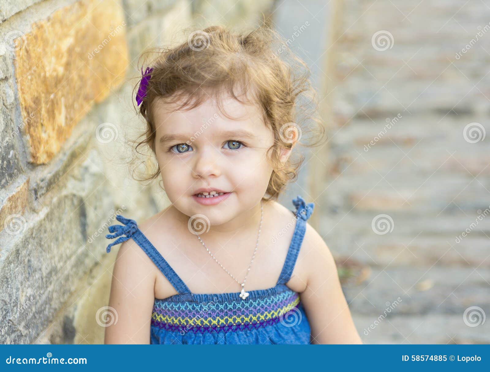 Little Girl in an Urban Setting Smiles at the Stock Image Image of