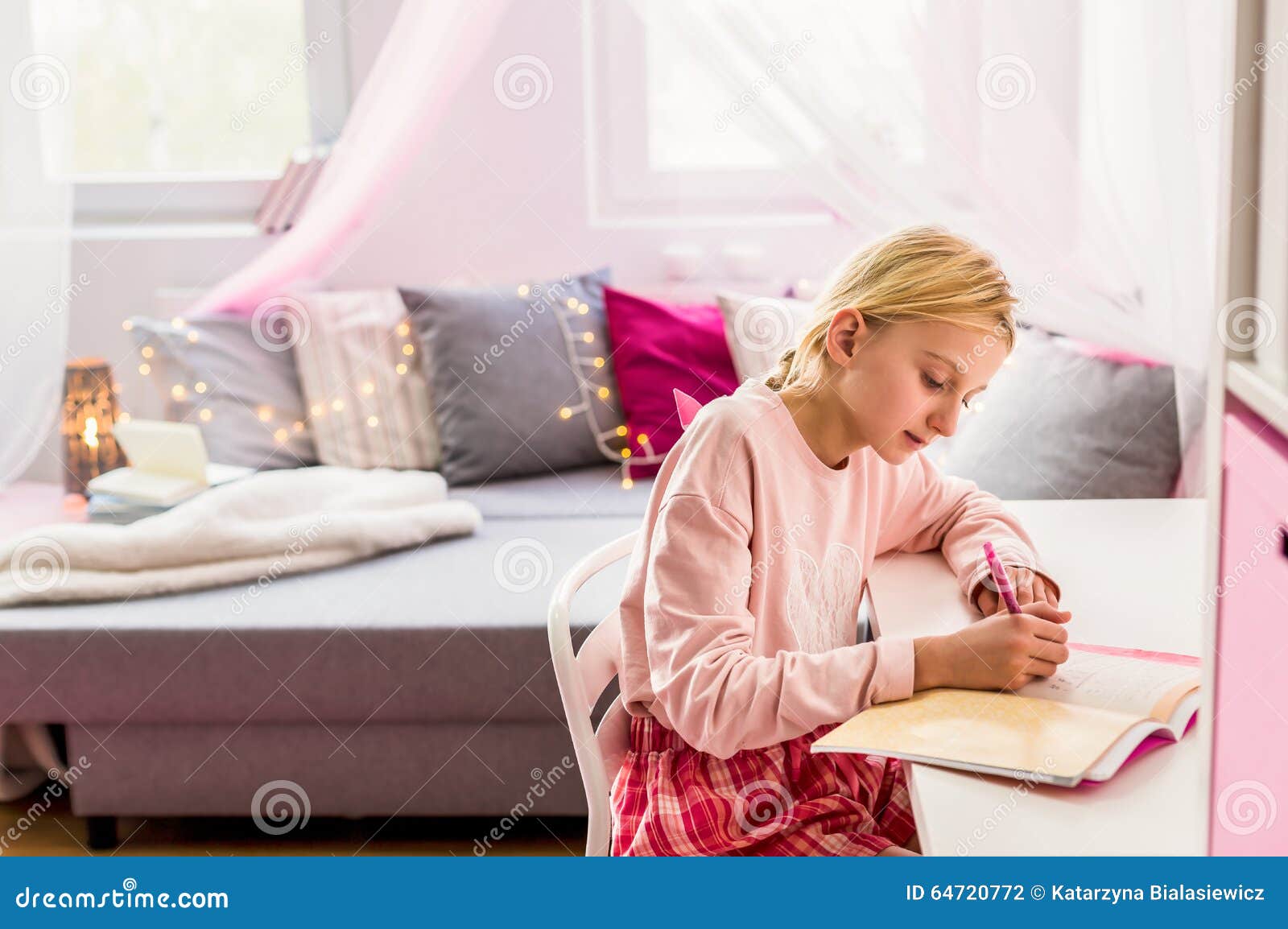 little girl writing diary