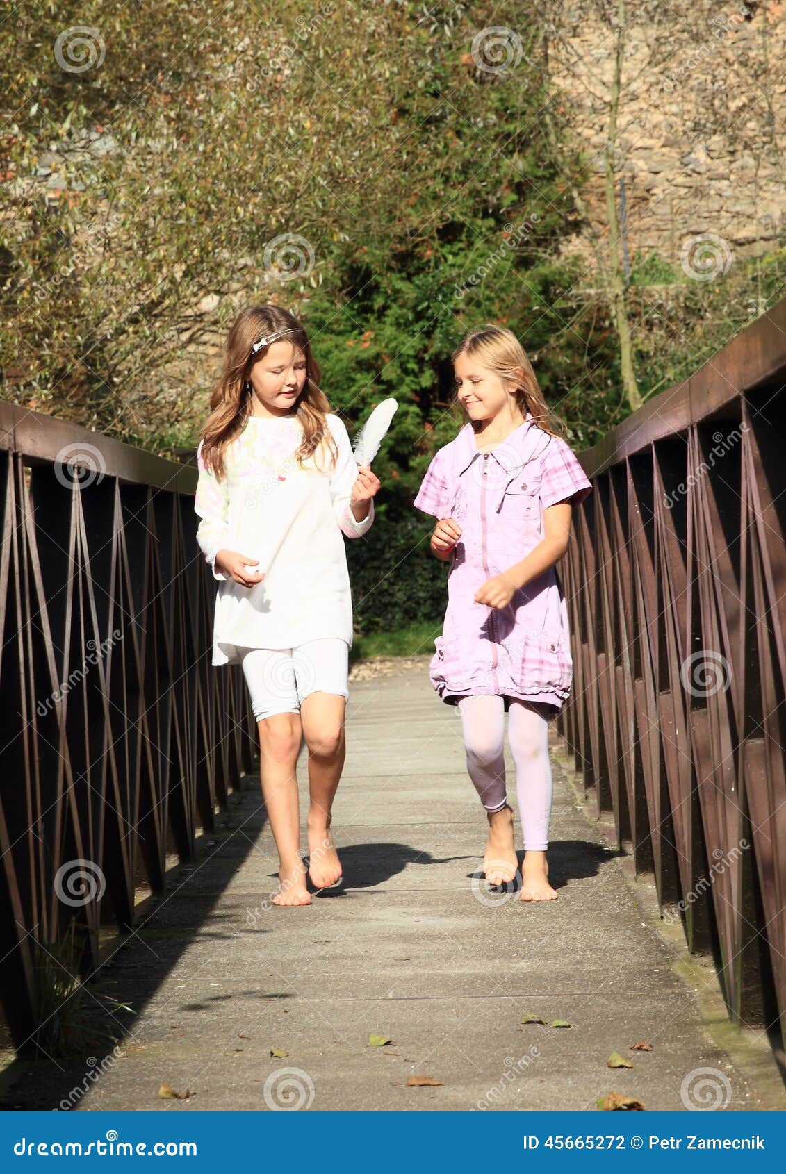 https://thumbs.dreamstime.com/z/little-girls-bridge-barefoot-kids-walking-watching-white-feather-45665272.jpg