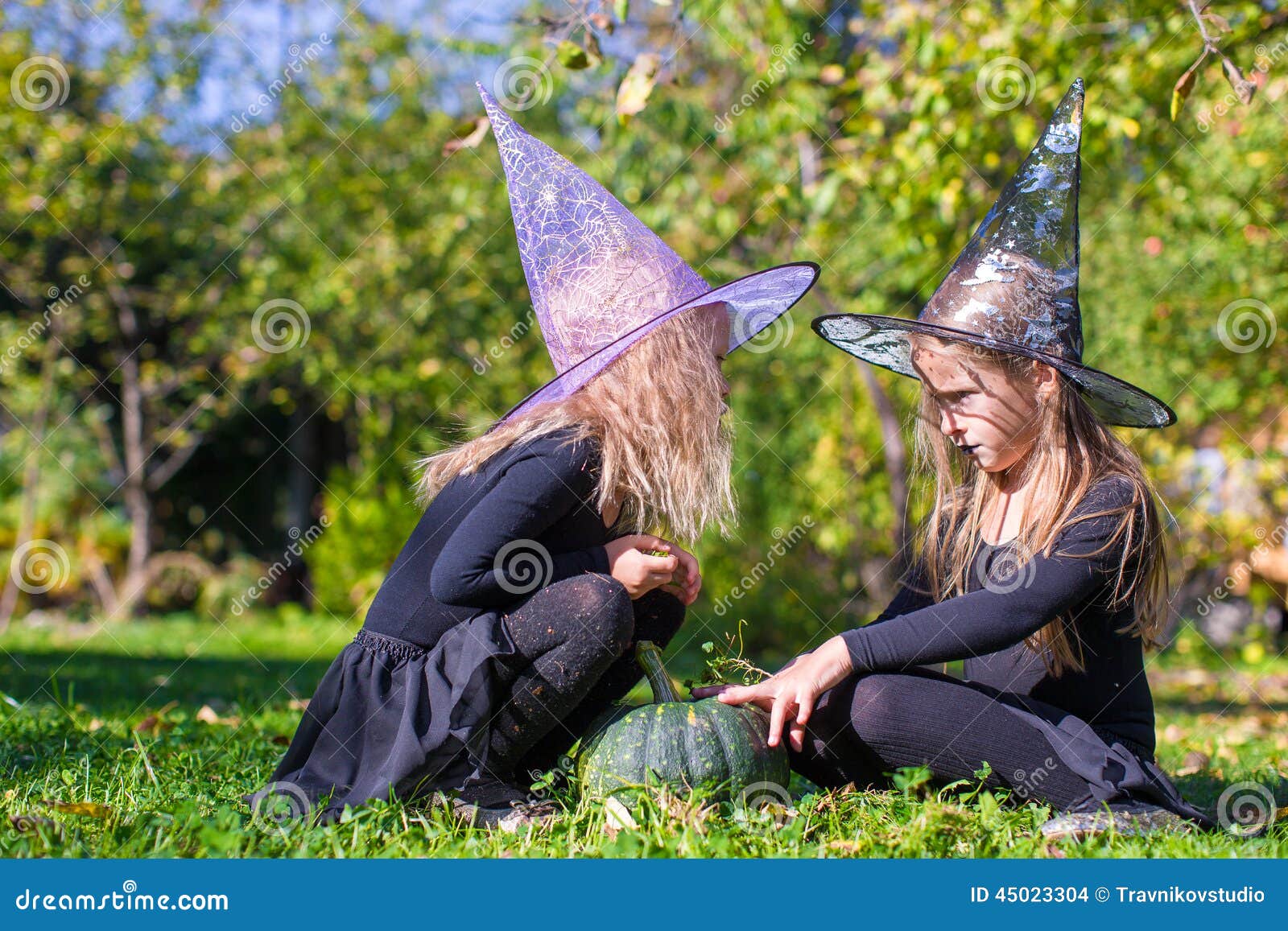 Little Girls Casting a Spell on Halloween in Witch Stock Photo - Image ...