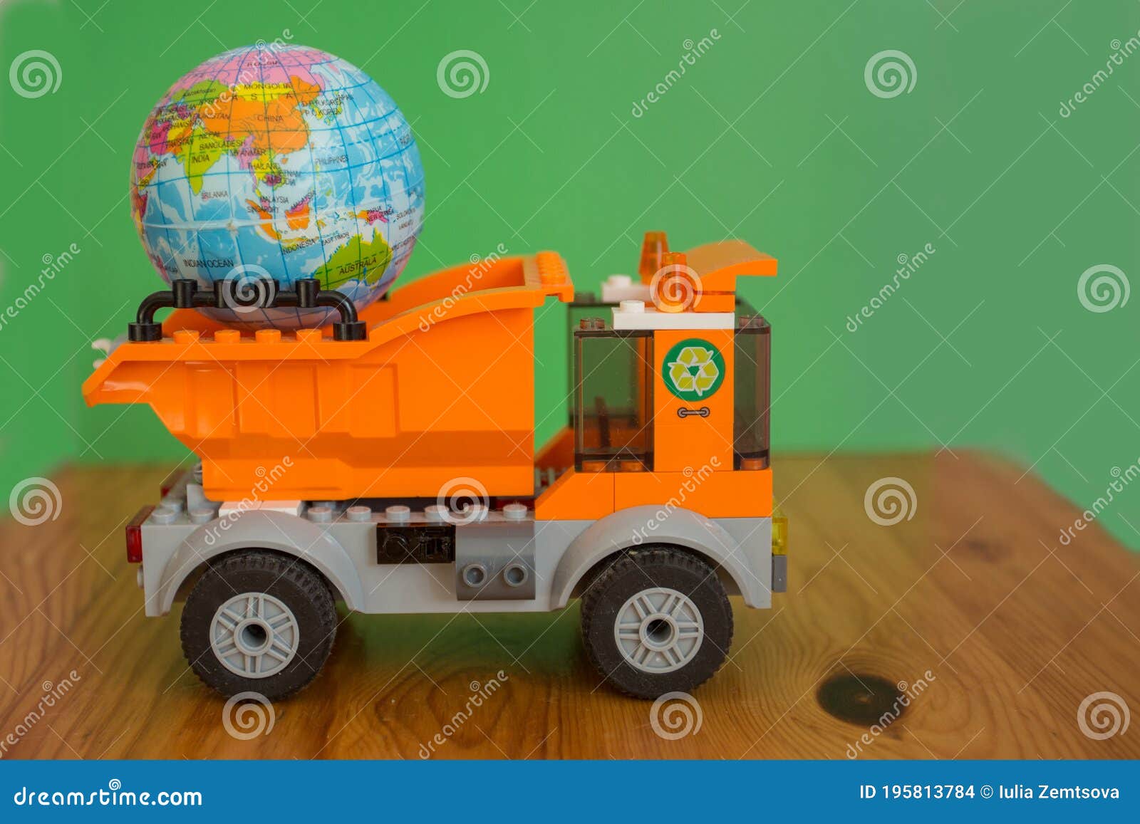 little globe in garbage truck. eco concept.