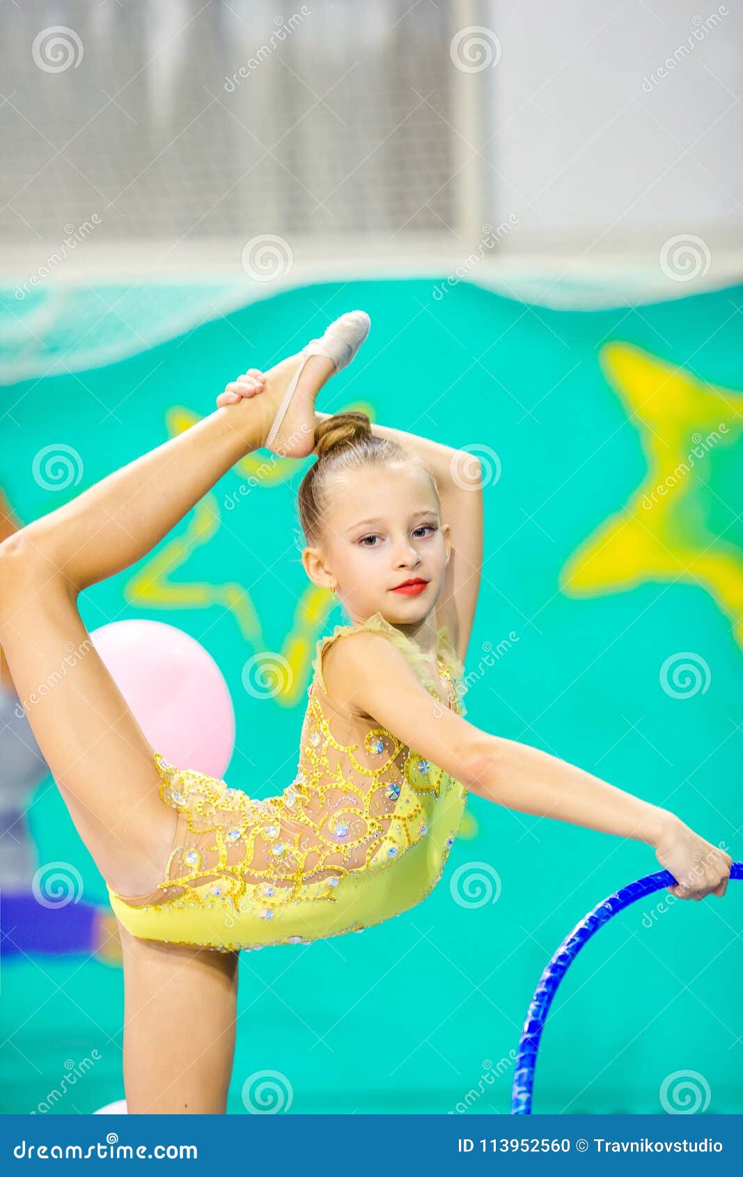 Little Beautiful Gymnast in Competitions of Rhythmic Gymnastics