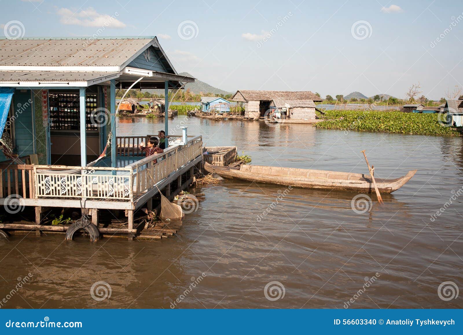 Little House on the water with a terrace Lake of Cambodia, the Tonle Sap. Hundreds of floating houses are located on the water. In these people live permanently. This way of life has become normal for them. Quite a large lake in Cambodia - Tonle Sap. He was even called inland sea of this country. However, its value is very variable - almost all year round with an area of â€‹â€‹2700 km2, on average, and only during the rainy season, it is poured into the neighborhood, flooding local fields, meadows, forests ... lake increases during this period is almost 6 times. It lasts for long: a couple of months the water descends, and the size of the sea is once again becoming the same.