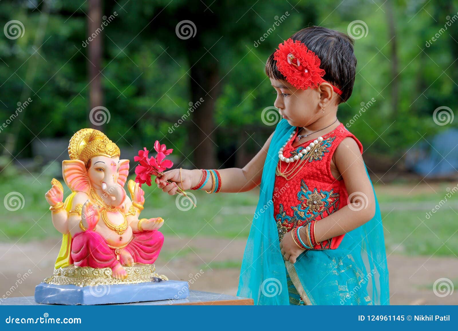 Little Indian Girl Child with Lord Ganesha and Praying , Indian ...