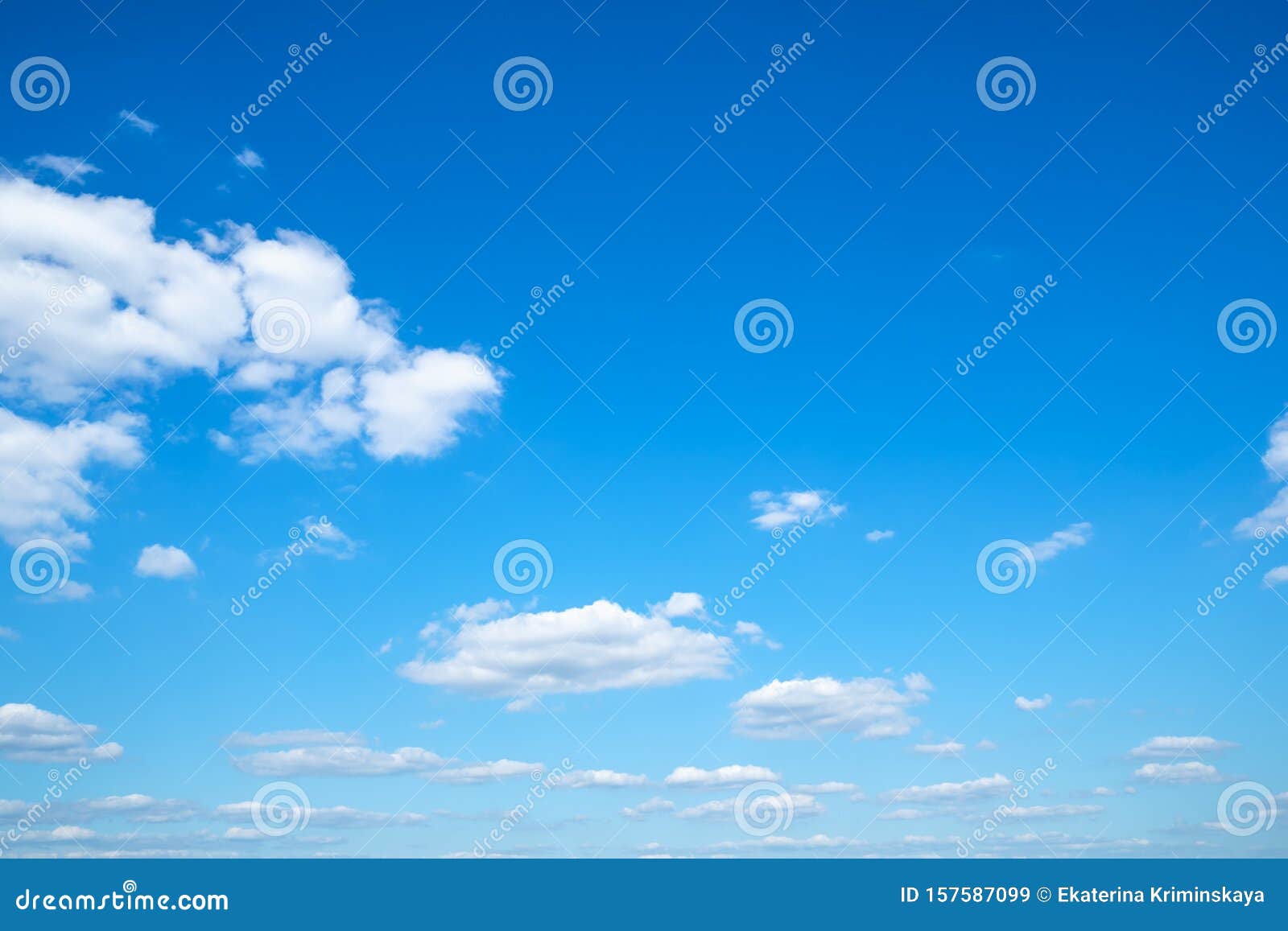 little light cumuli clouds in blue sky