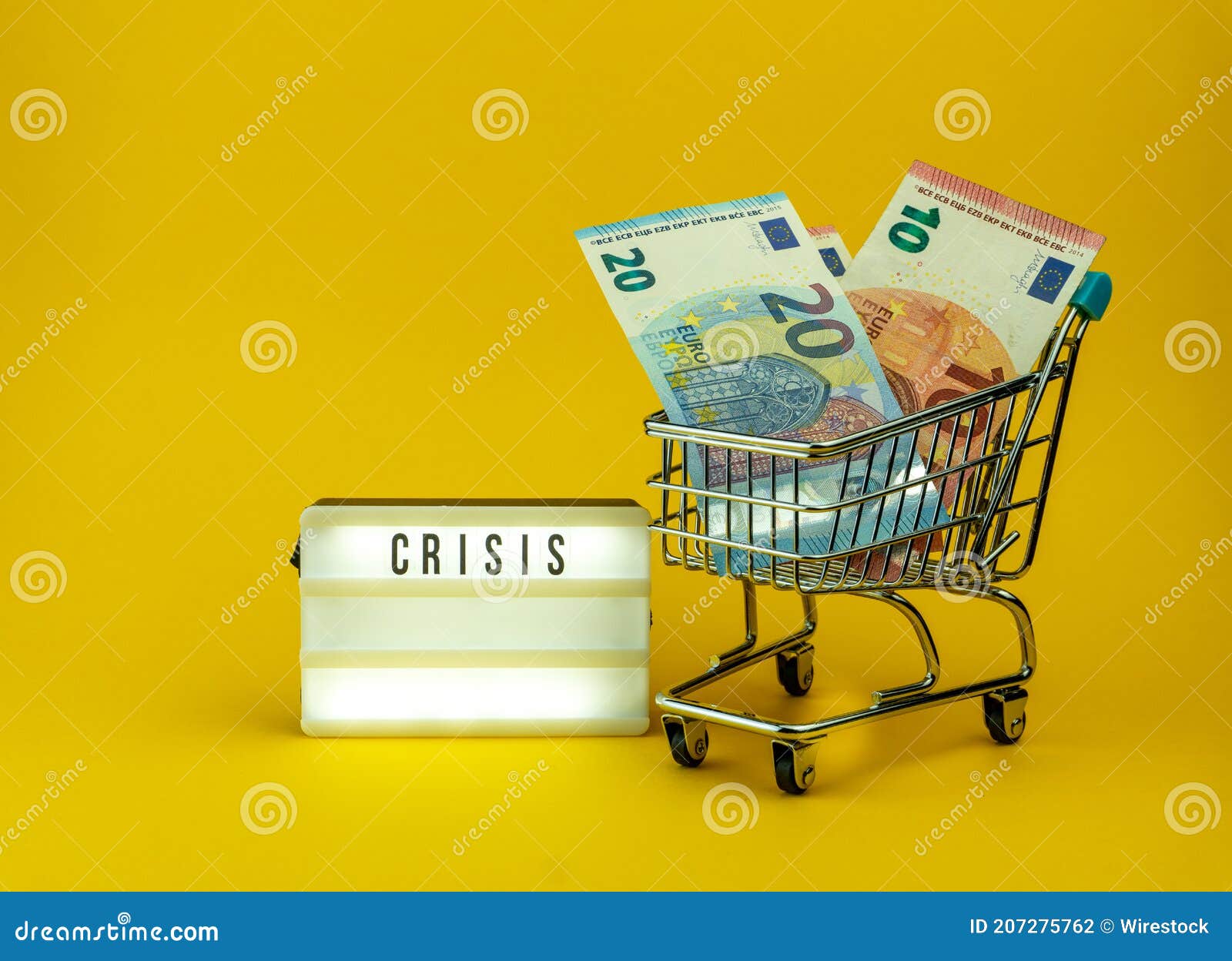 little metallic cart, euro banknote and a sign of crise covid