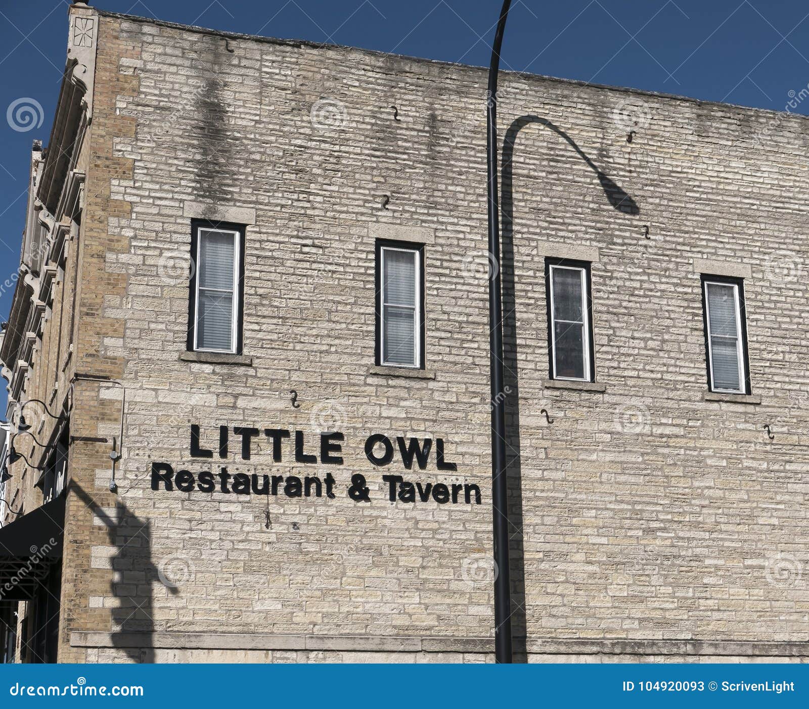 Little Owl editorial stock photo. Image of sign, downtown 104920093