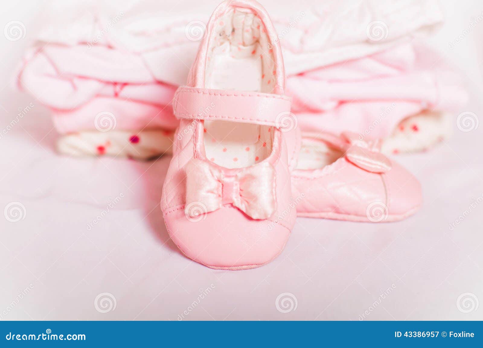 Little Pink Baby Shoes and Baby Clothes Stock Image - Image of ...