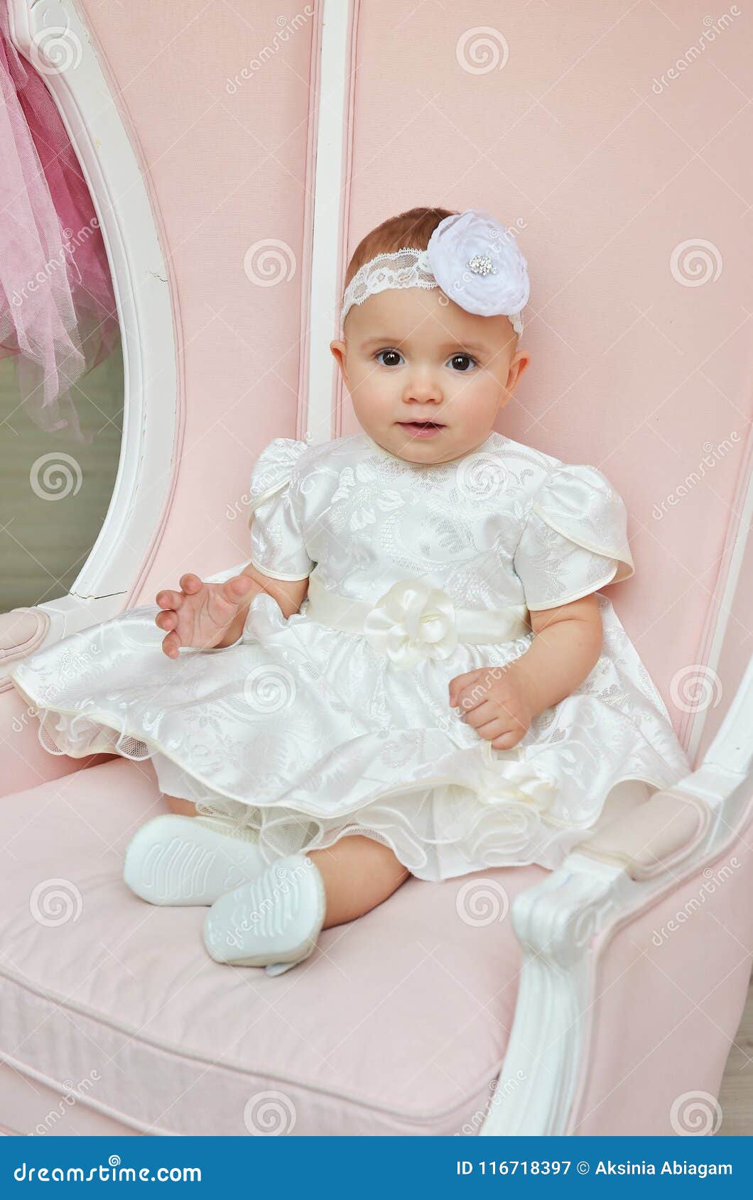 cute baby in white dress