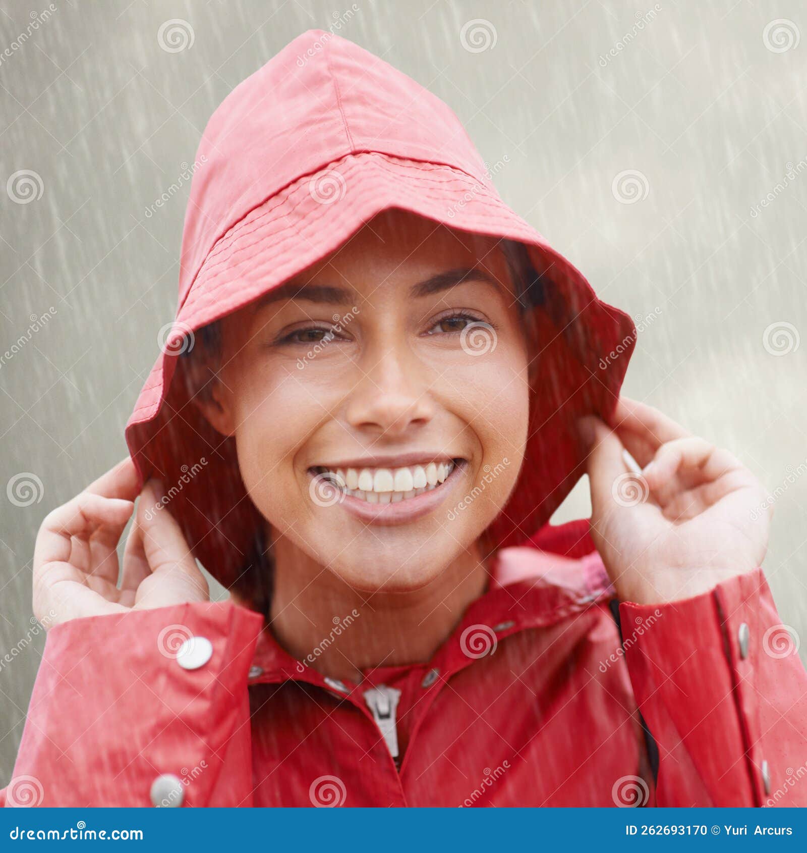 A Little Rain Wont Get Me Down. an Attractive Young Woman Standing in ...