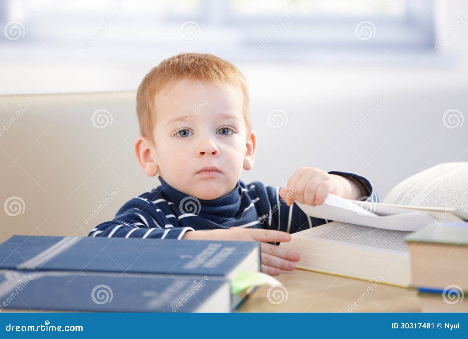 little scholar with encyclopedia