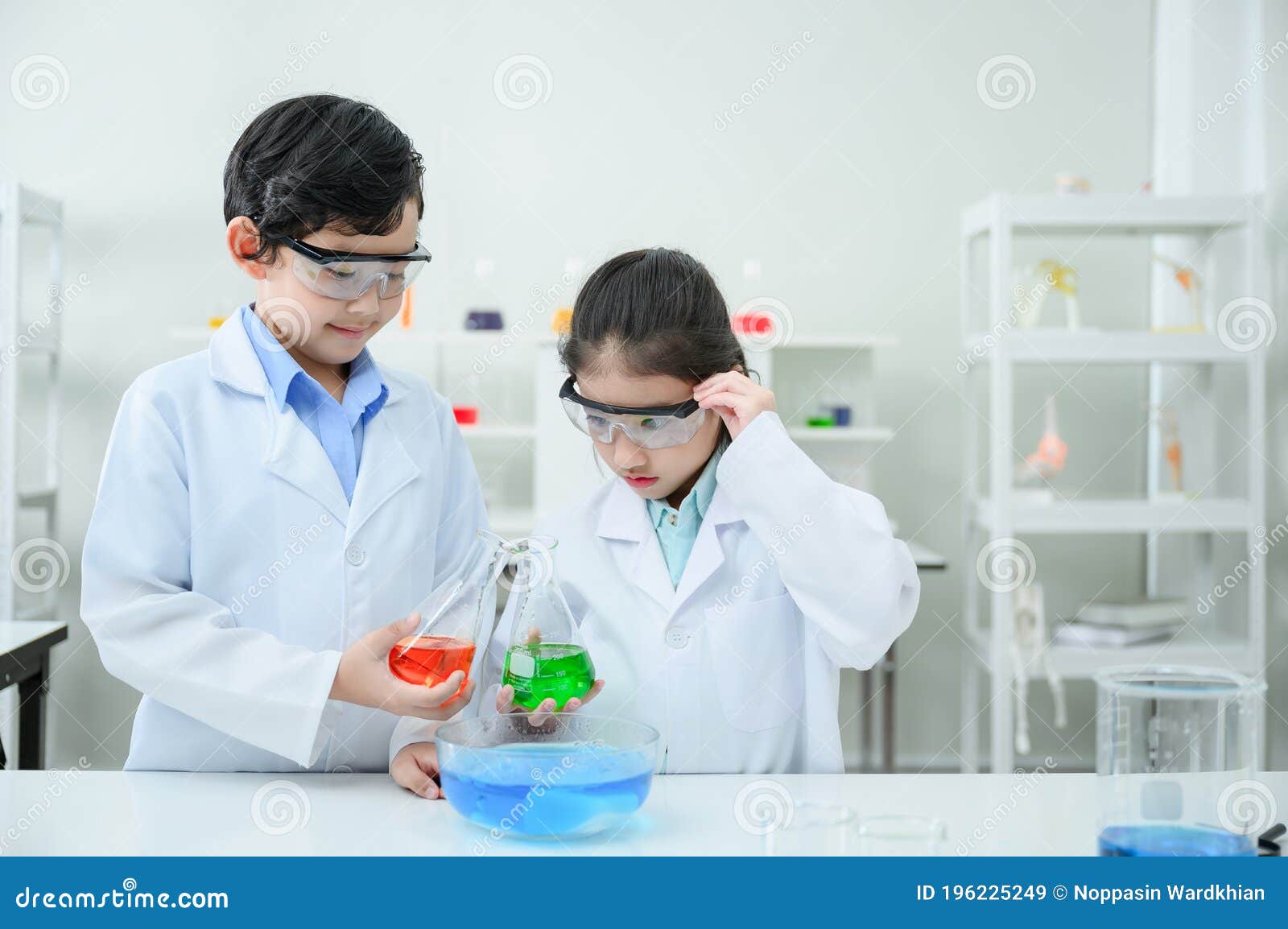 Little Scientists Adding Color Dye into Beakers Stock Image - Image of ...
