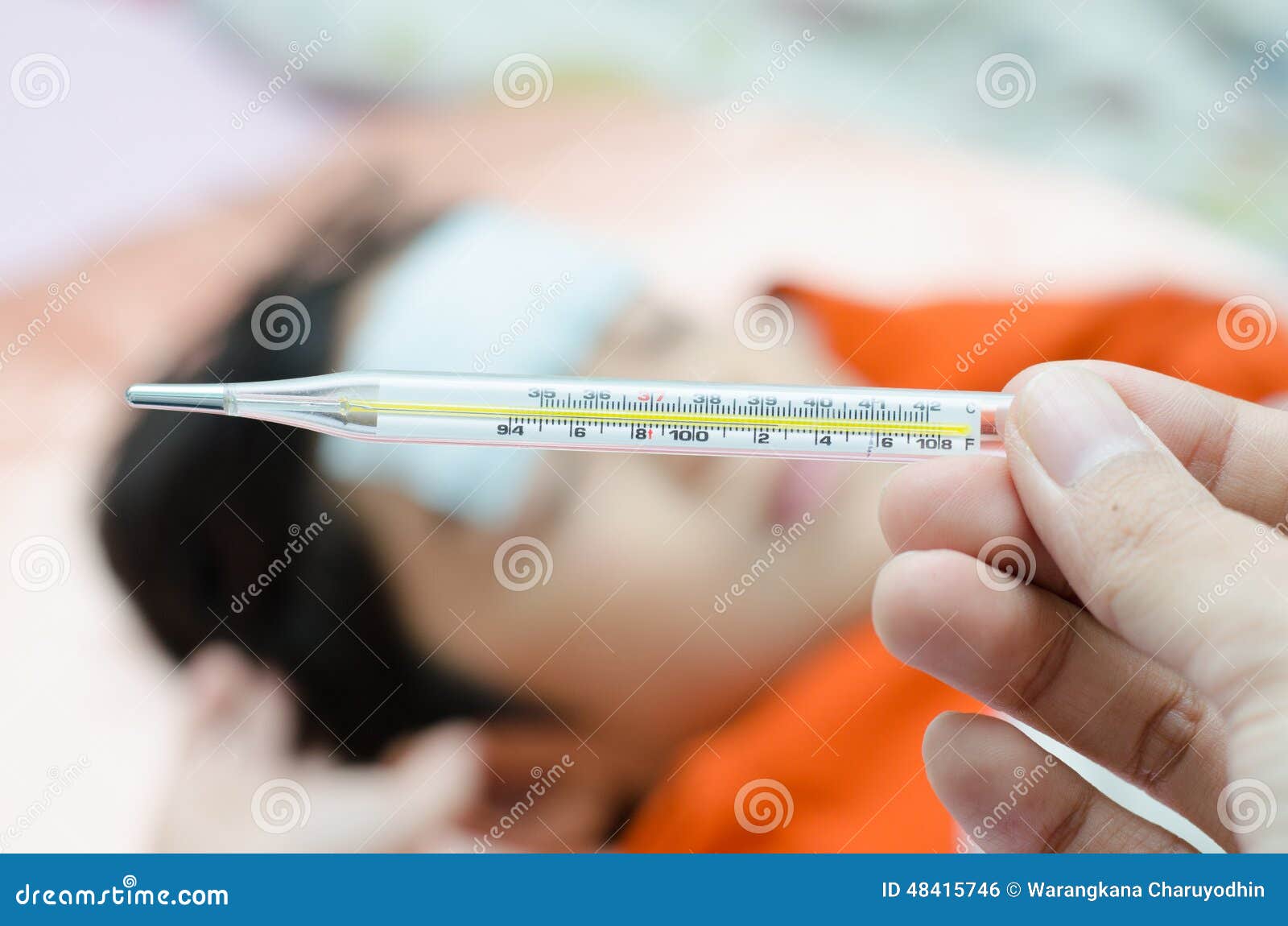 Little Sick Boy with Temperature Check Thermometer in Mouth Stock Photo
