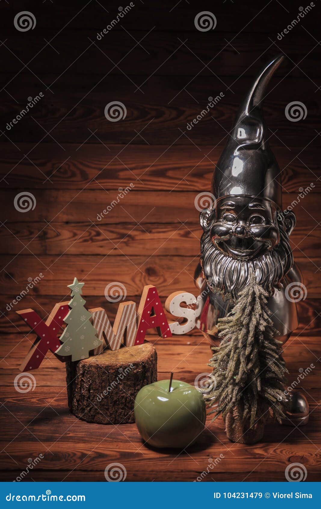 Little Silver Dwarf Near  Christmas  Decorations  Stock Image 