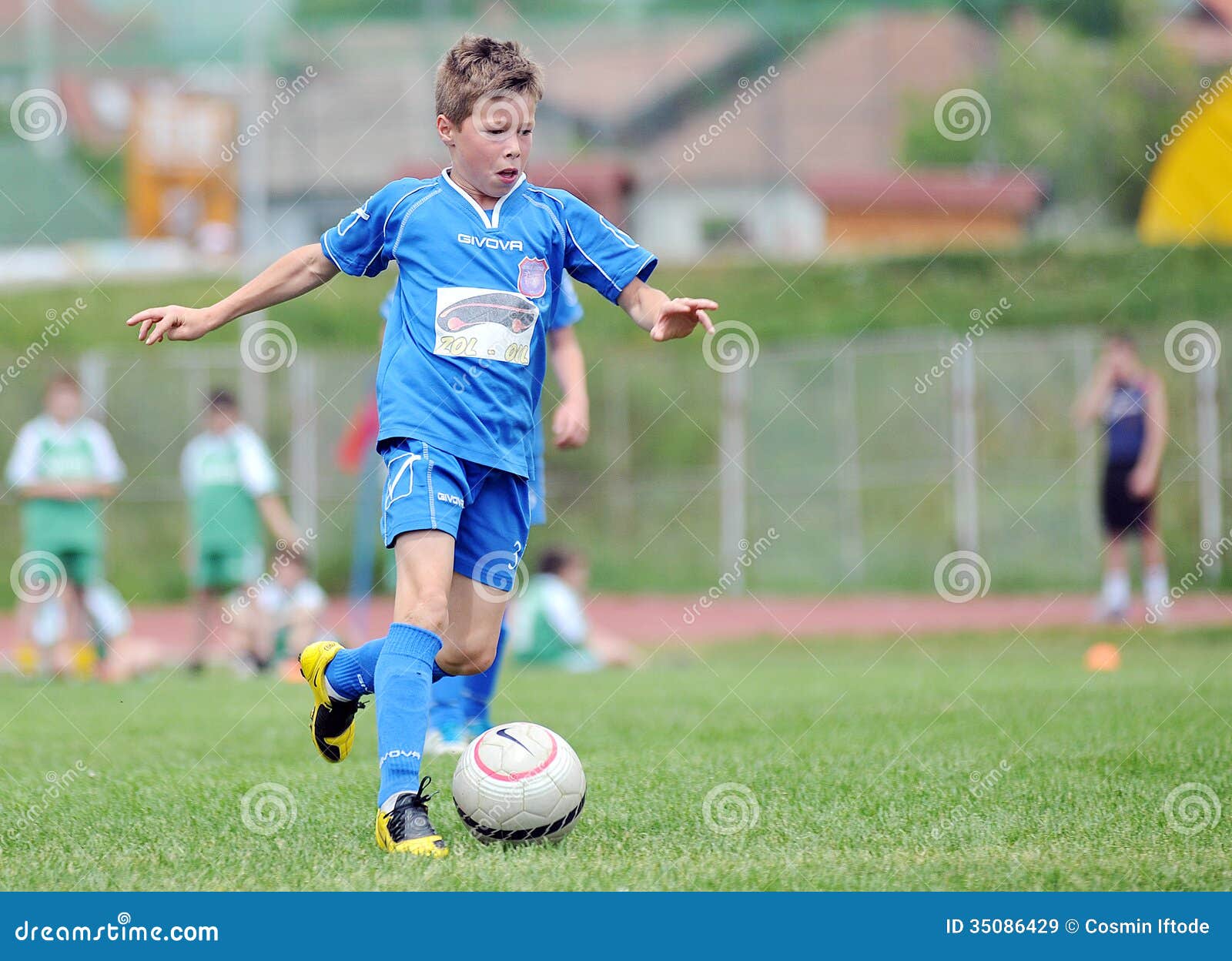 Little Single Child Plays Football Or Soccer Editorial Stock Image