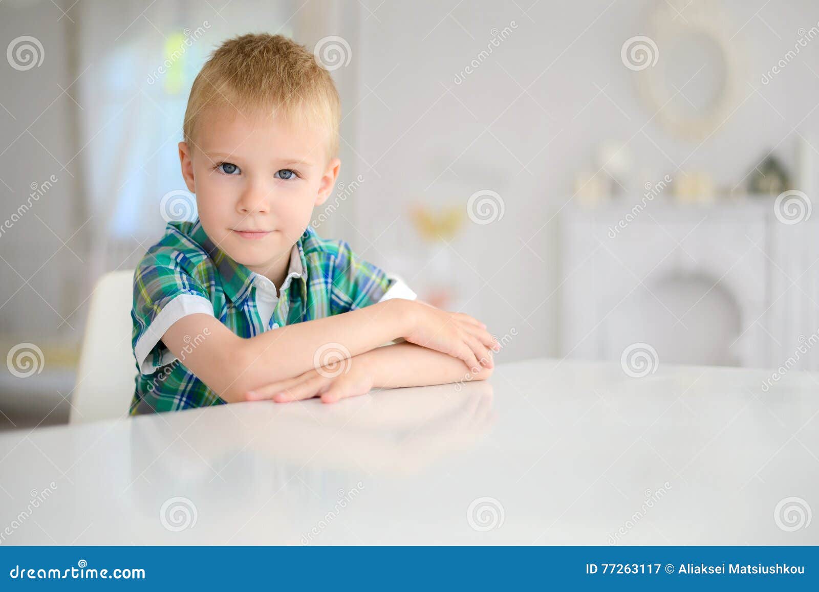 Little Smiling Boy Sitting at Table Stock Image Image of head