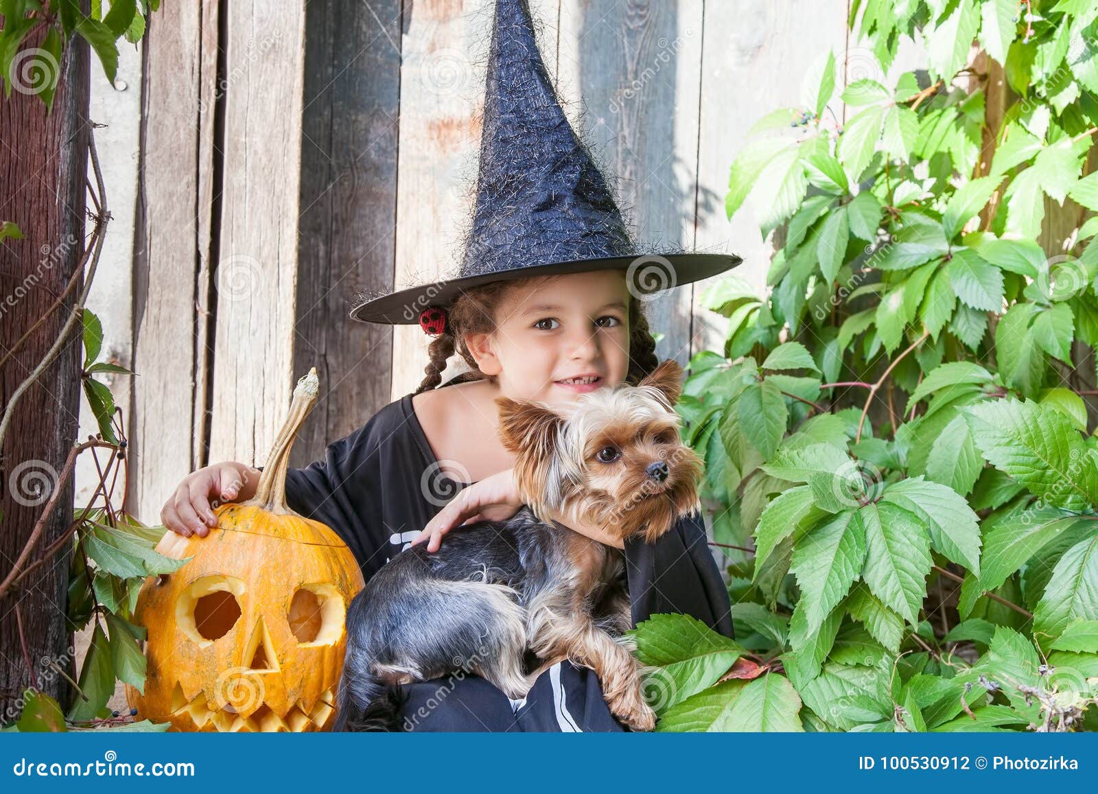 Download Little Witch With Halloween Pumpkin Stock Photo - Image of ...