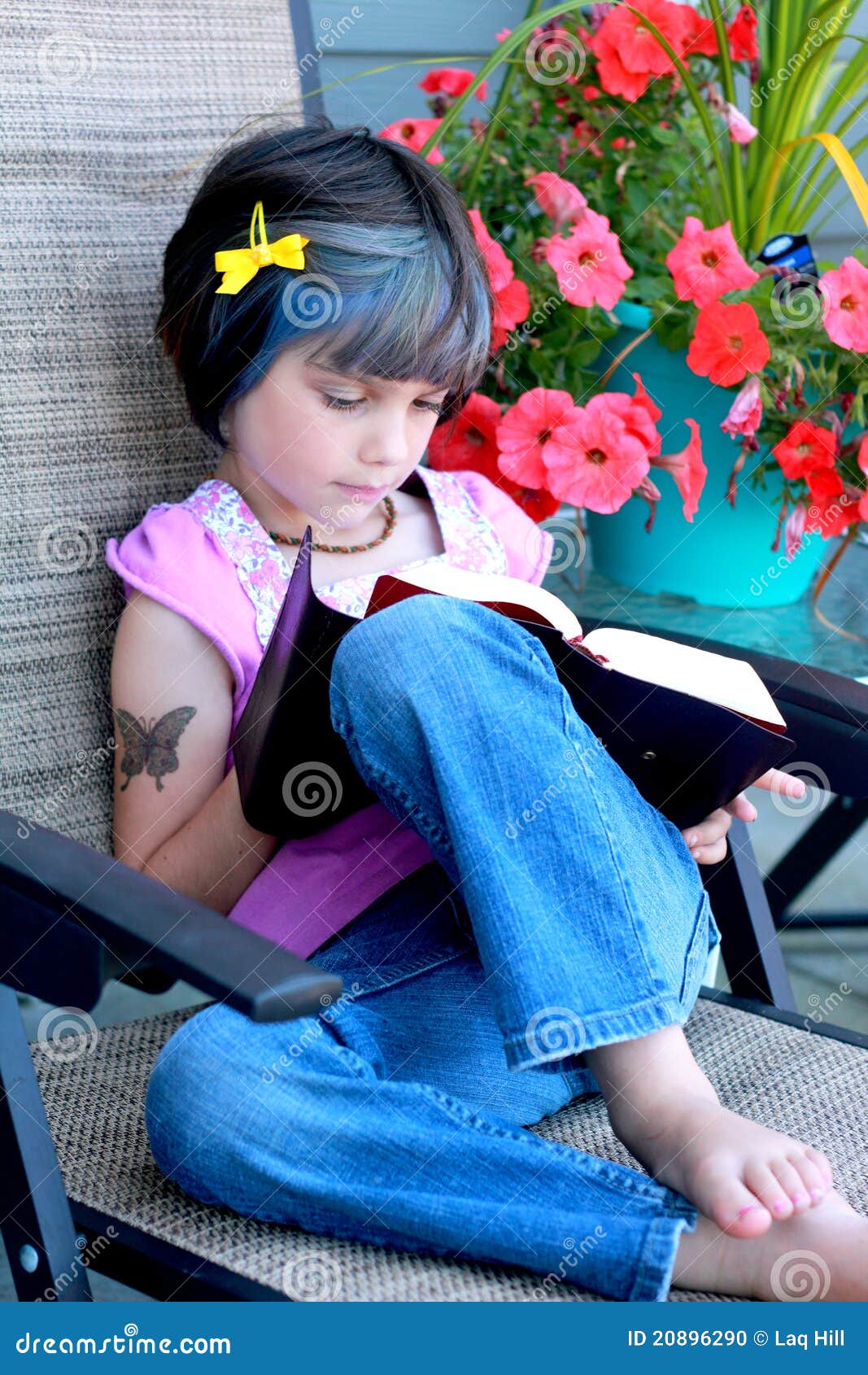 little yuppie girl reading book