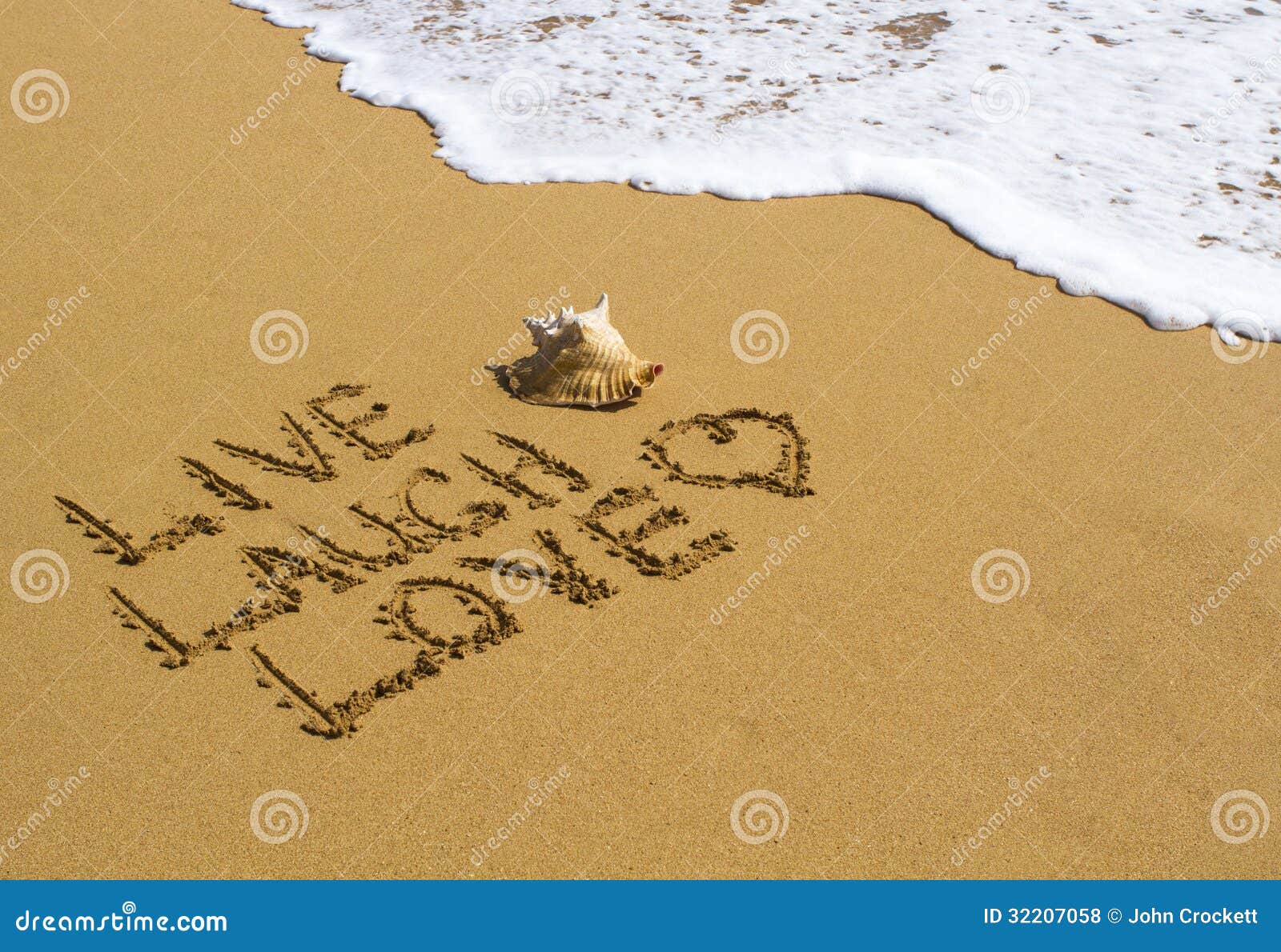 live, laugh, love - message on the beach