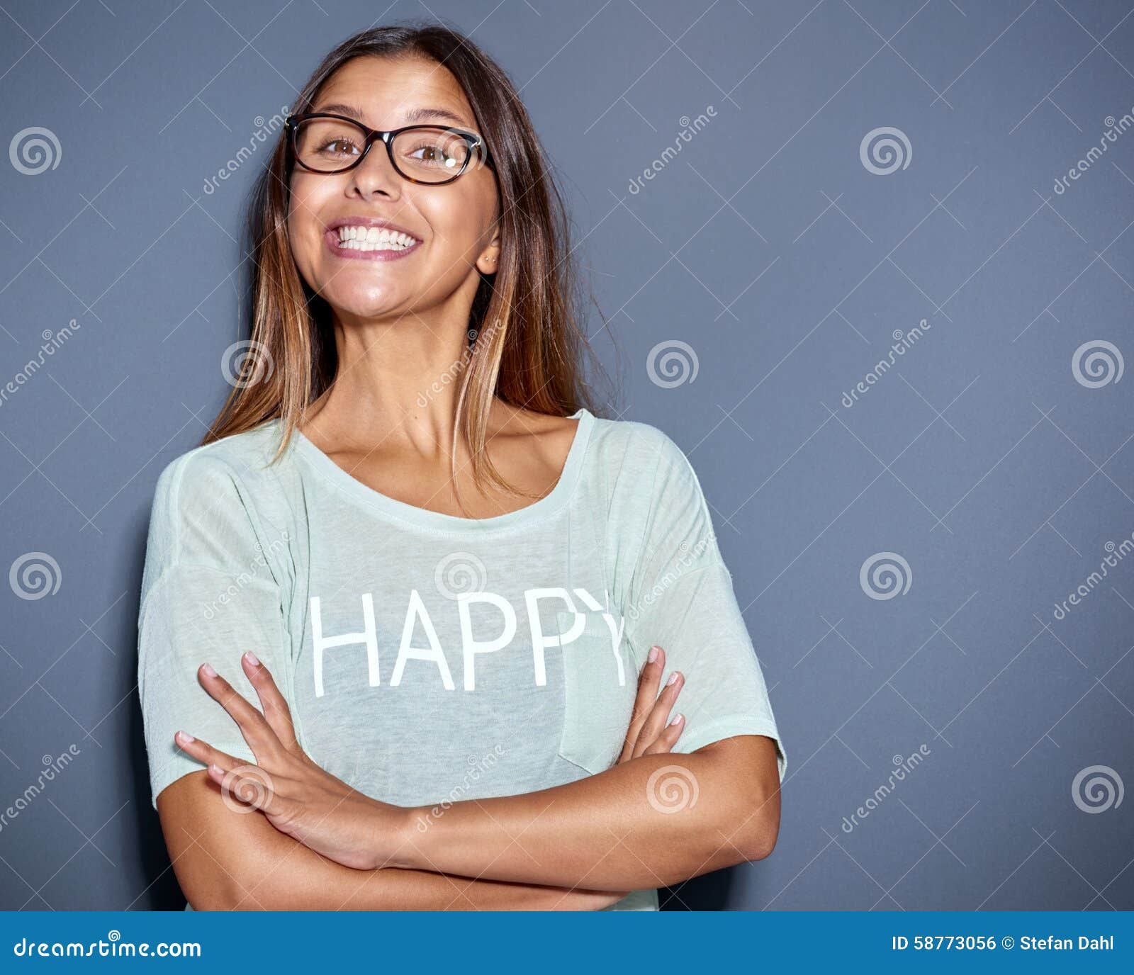 lively young woman with a big cheesy grin