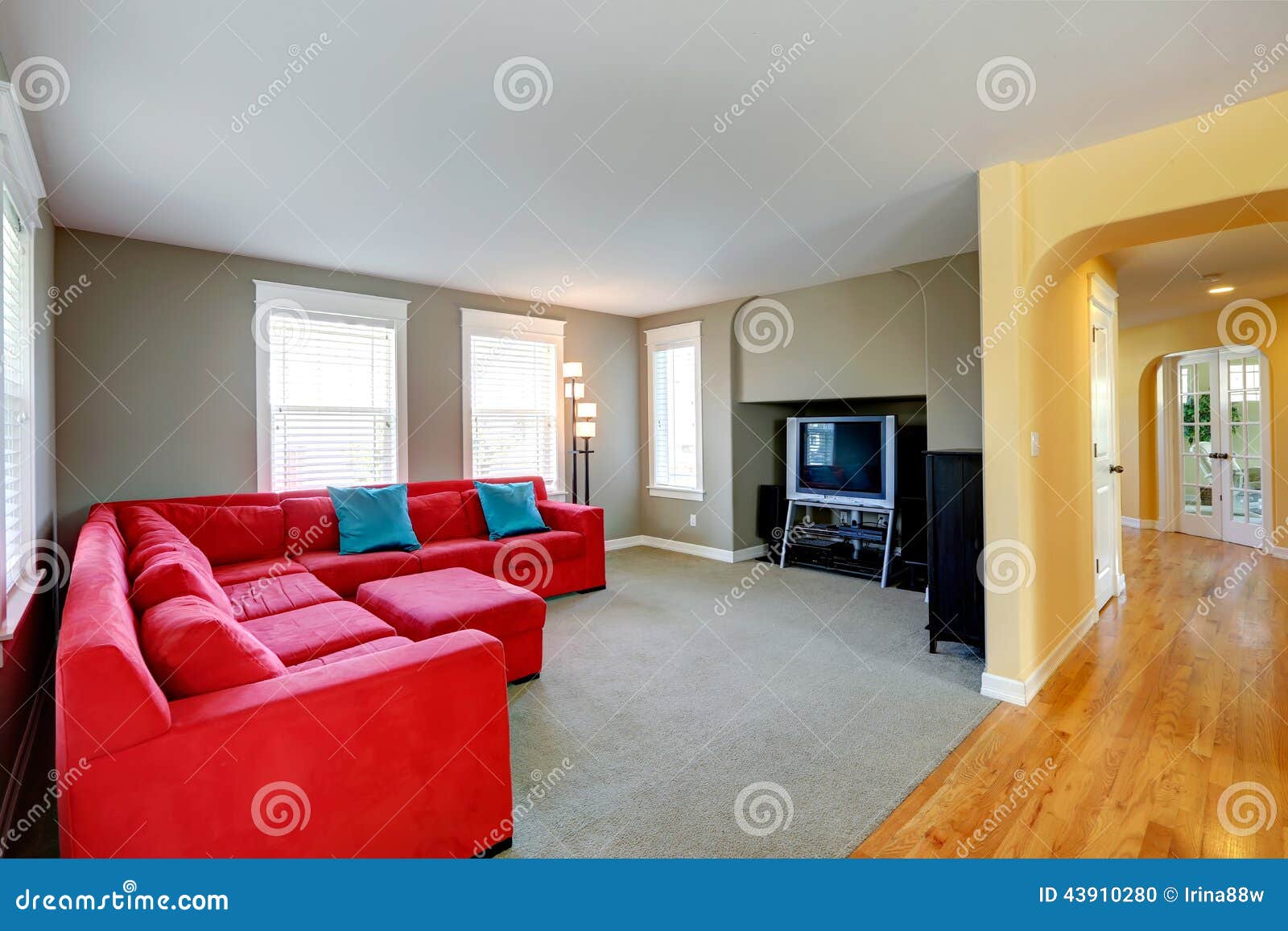 Living Room With Bright Red Couch And TV Stock Photo Image Of Sofa