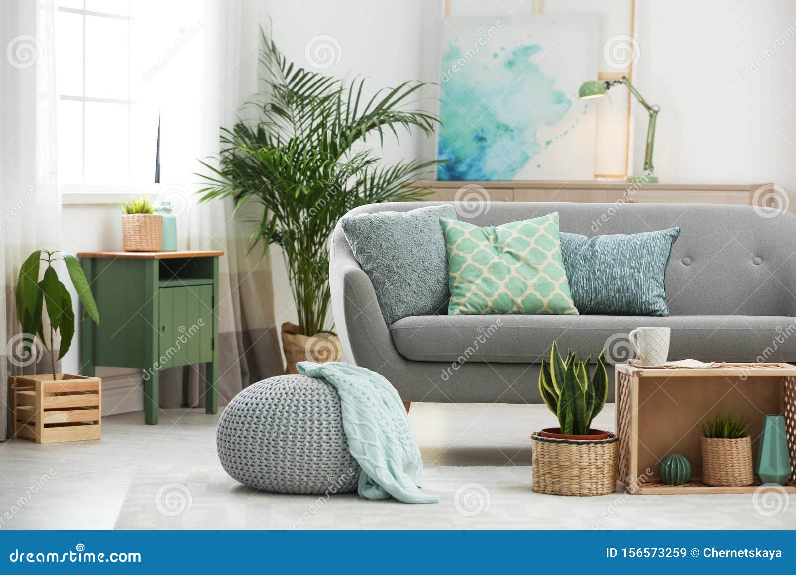 living room interior with houseplants and sofa