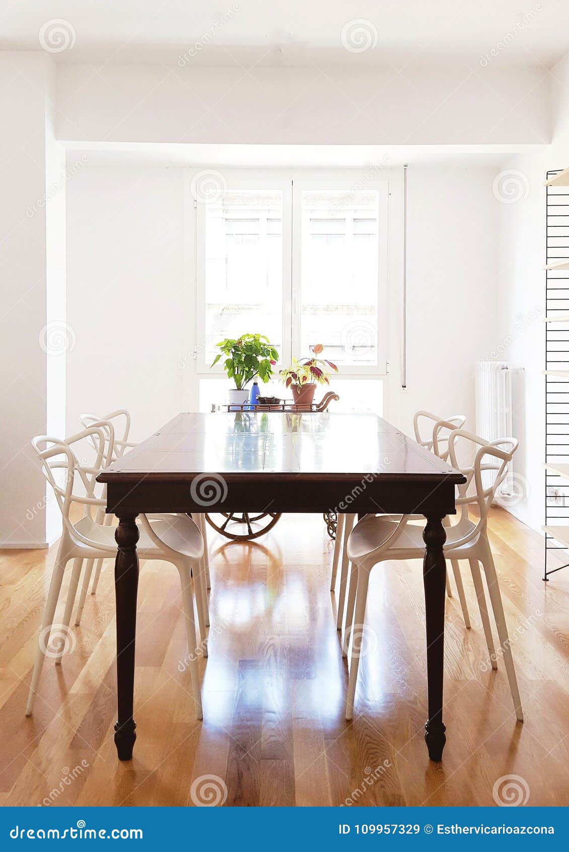 Wooden Table in Dining Room with a Window in the Background. Stock Image -  Image of window, luxury: 109957329