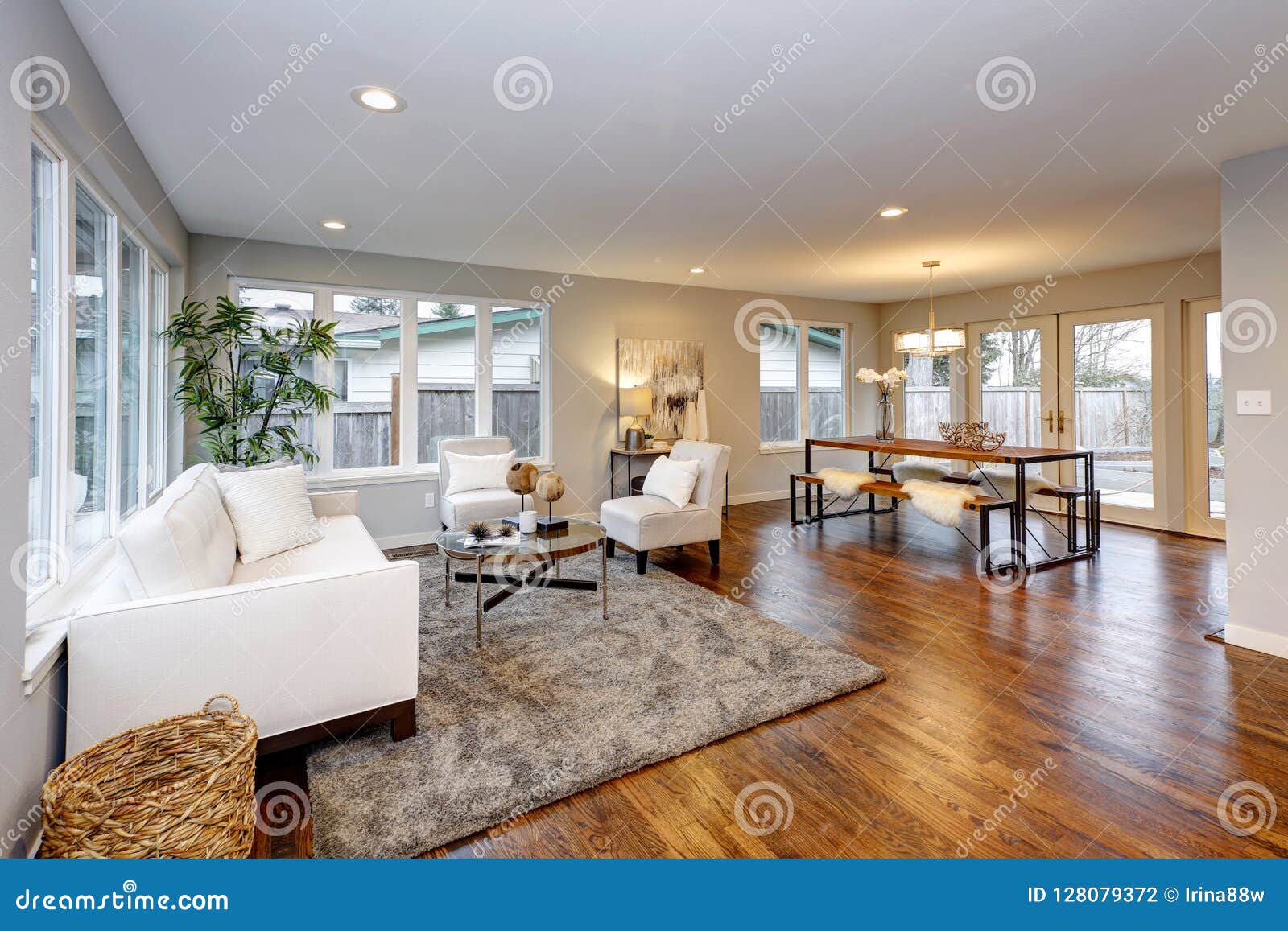 Living Room In Neutral Colors With Hardwood Floor Stock Photo