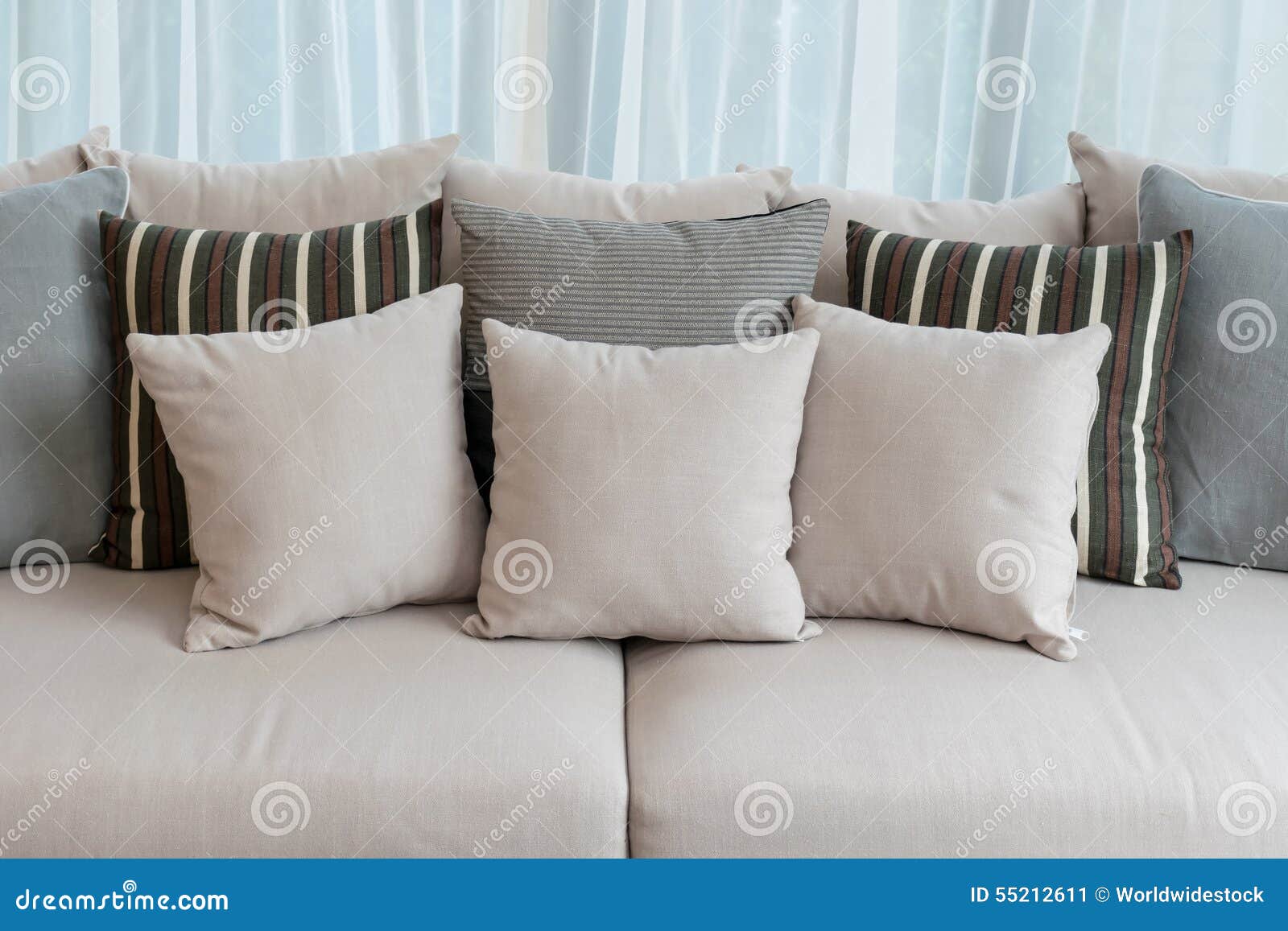 Living Room with Row of Pillows on Sofa Stock Image Image of